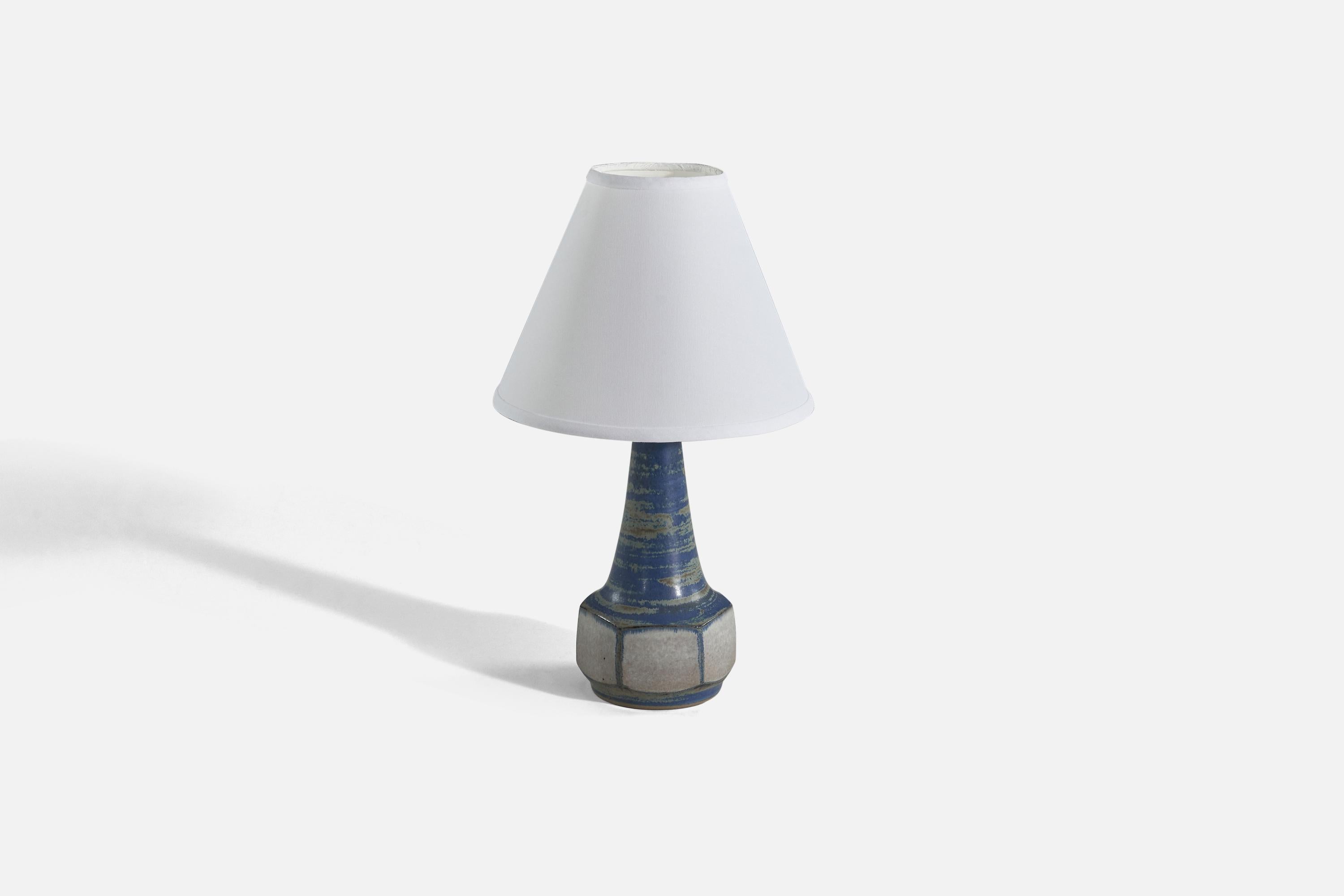 A blue and grey, glazed stoneware table lamp designed by Marianne Starck and produced by Michael Andersen Keramik, Denmark, 1960s. 

Sold without lampshade. 
Dimensions of Lamp (inches) : 11.5 x 5.21 x 4.91 (Height x Width x Depth)
Dimensions of