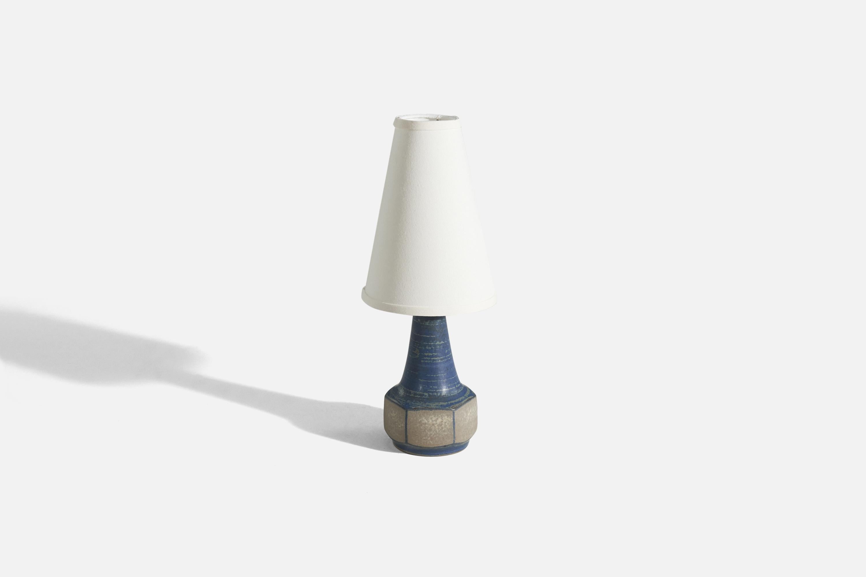 A pair of blue and grey, glazed stoneware table lamps designed by Marianne Starck and produced by Michael Andersen Keramik, Denmark, 1960s. 

Sold without lampshades. 
Dimensions of lamp (inches) : 12.25 x 5.24 x 4.9 (height x width x