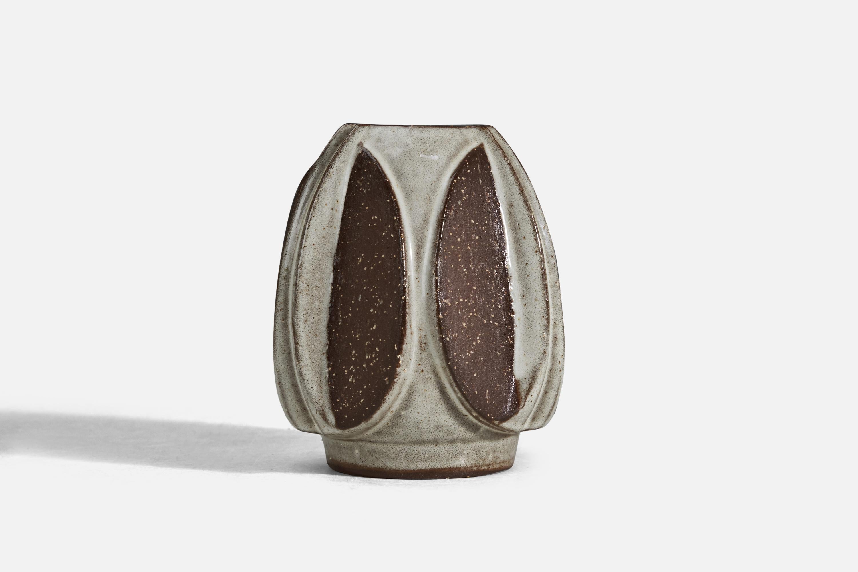 A brown and white glazed stoneware vase designed by Marianne Starck and produced by Michael Andersen, Denmark, 1960s.