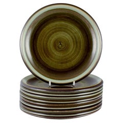 Marianne Westman for Rörstrand. "Maya", set of ten plates with green-toned glaze