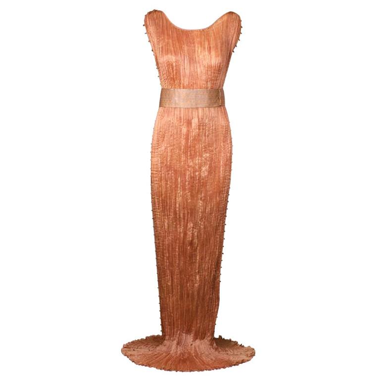 Mariano Fortuny apricot Delphos gown, early 20th century, offered by Vintage Luxury