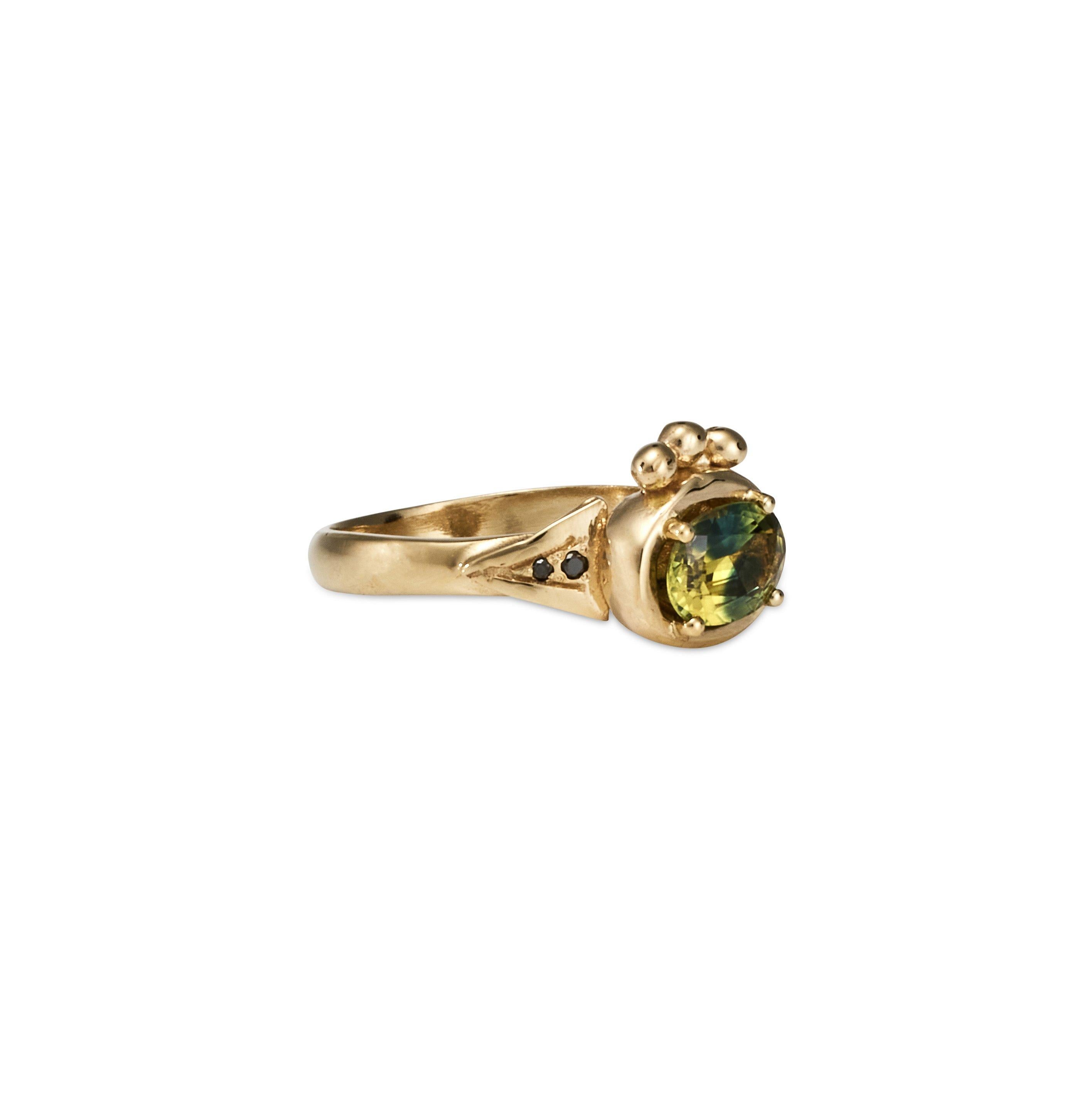 Marica Ring, 14 Karat Yellow Gold with Australian Parti Sapphire and Black Diamond
Handcrafted and individually cast in solid gold. Olivia carves each piece from wax, making these items unique, which we believe is what gives them their beauty. The