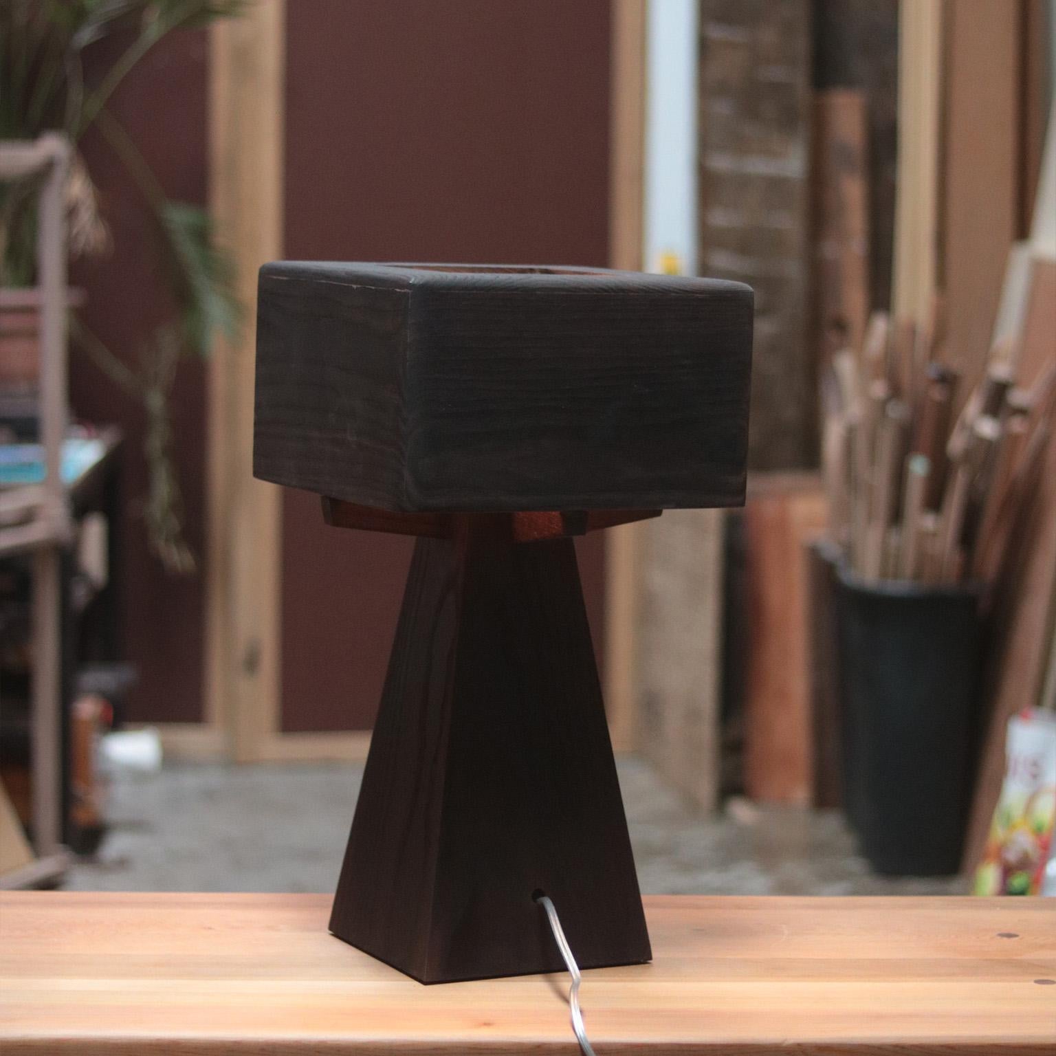 The Marici lamp presents itself as a resplendent embodiment of elegance, striking a balance between form and function that captivates the beholder. Its silhouette, sculptural and graceful, is a testament to the artistry of design, effortlessly