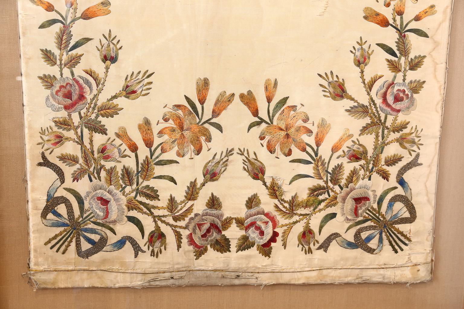 Marie Antoinette hand- embroidered monogram on silk.