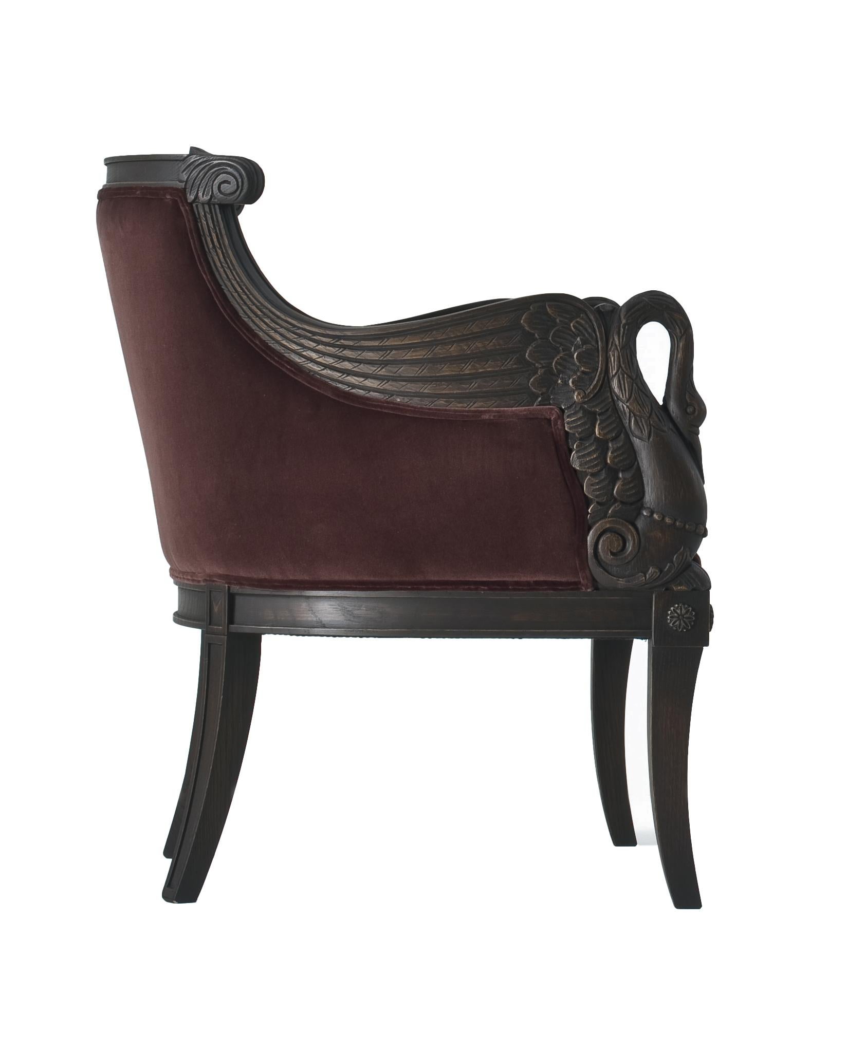 Adorned with intricately hand-carved swans on its armrests, Marie is an Italian masterpiece crafted from solid wood with a rich carrubo finish. Wrapped in luxurious brown velvet, this chair seamlessly combines artistry with comfort, inviting you to