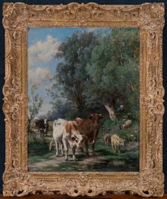 Vaches et les moutons par l'eau