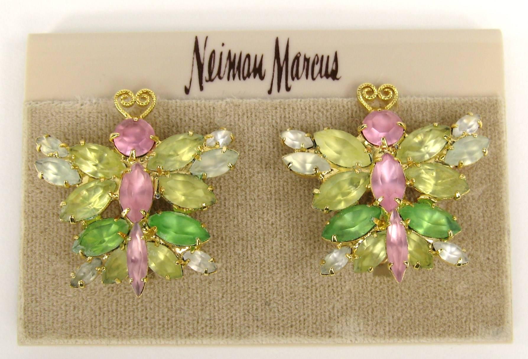 A Pair of Earrings from renowned Jewelry Maker Maria Ferra. Prong-set multi-colored crystals make up the butterfly. These are clip on's. They measure 1.23 inches w x 1.3 inches wide on your ear.  Earrings dating to the early 1990s. FROM A PRIVATE