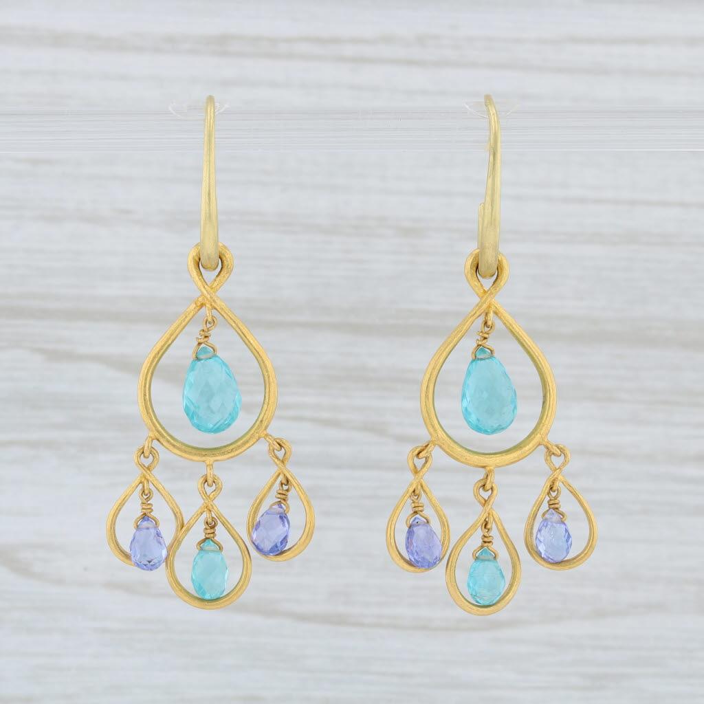 These earrings are a Marie Helene de Taillac design featuring elegant teardrop designs accented by sparkling briolette gemstones.

Gem: Natural Apatite - 3.1 x 4.8 mm and 4 x 5 x 7.5 mm, Briolette Cut, Turquoise Blue Color
- Natural Tanzanite - 2.2