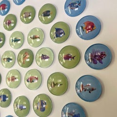 Piscis 5 : art mural contemporain en 3D inspiré de la nature avec des poissons bleus et verts.