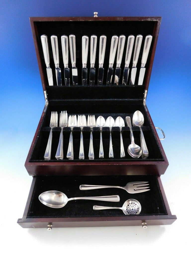 Marie Louise by Blackinton sterling silver flatware set, 63 pieces. This set includes:

12 knives, 8 3/4