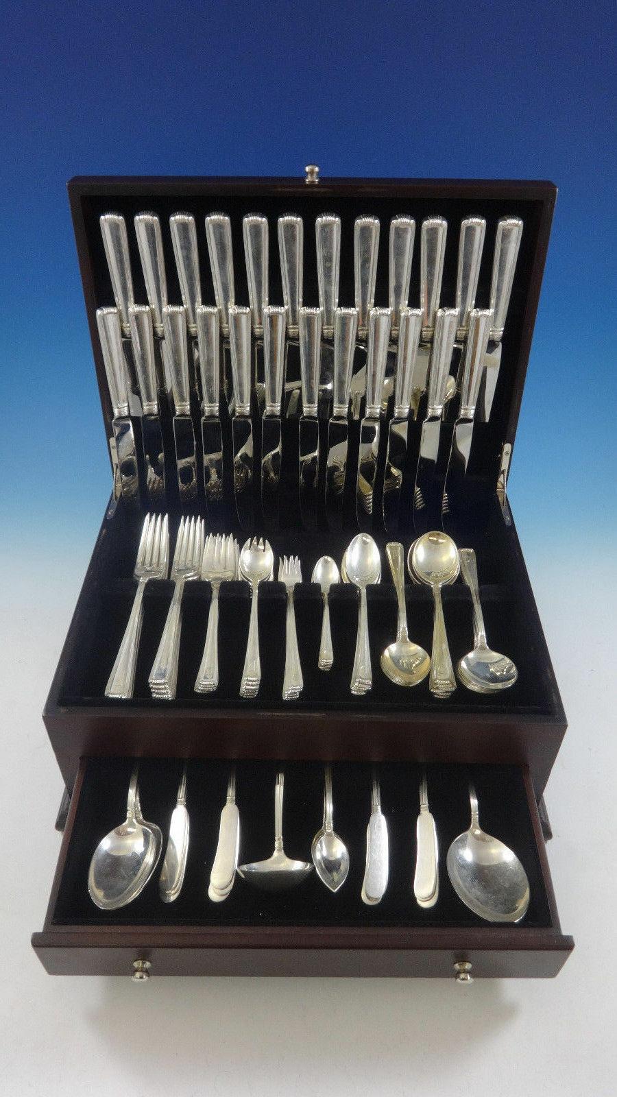 Monumental Marie Louise by Cartier sterling silver flatware set, 175 pieces. This set includes:

12 dinner size knives, 9 1/2
