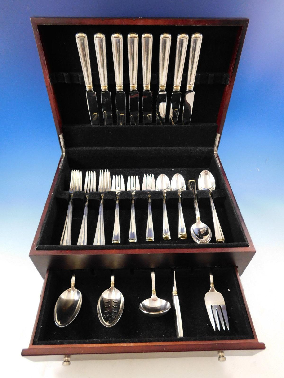 Dinner size Marie Louise with gold accent by Blackinton sterling silver flatware set, 45 pieces. This set includes:

8 dinner size knives, 9 3/4