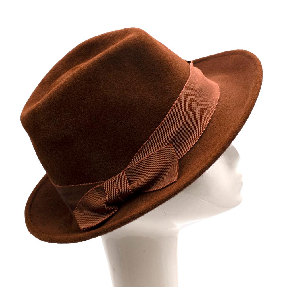 Marie Mercie Brown Felt Hat 

-Rich warm brown color  
-Luxurious soft texture 
-Cotton band 
-Bow detail on the side

Materials:

Main: 100% high quality rabbit felt

Made in France

Circumference- 58 cm 