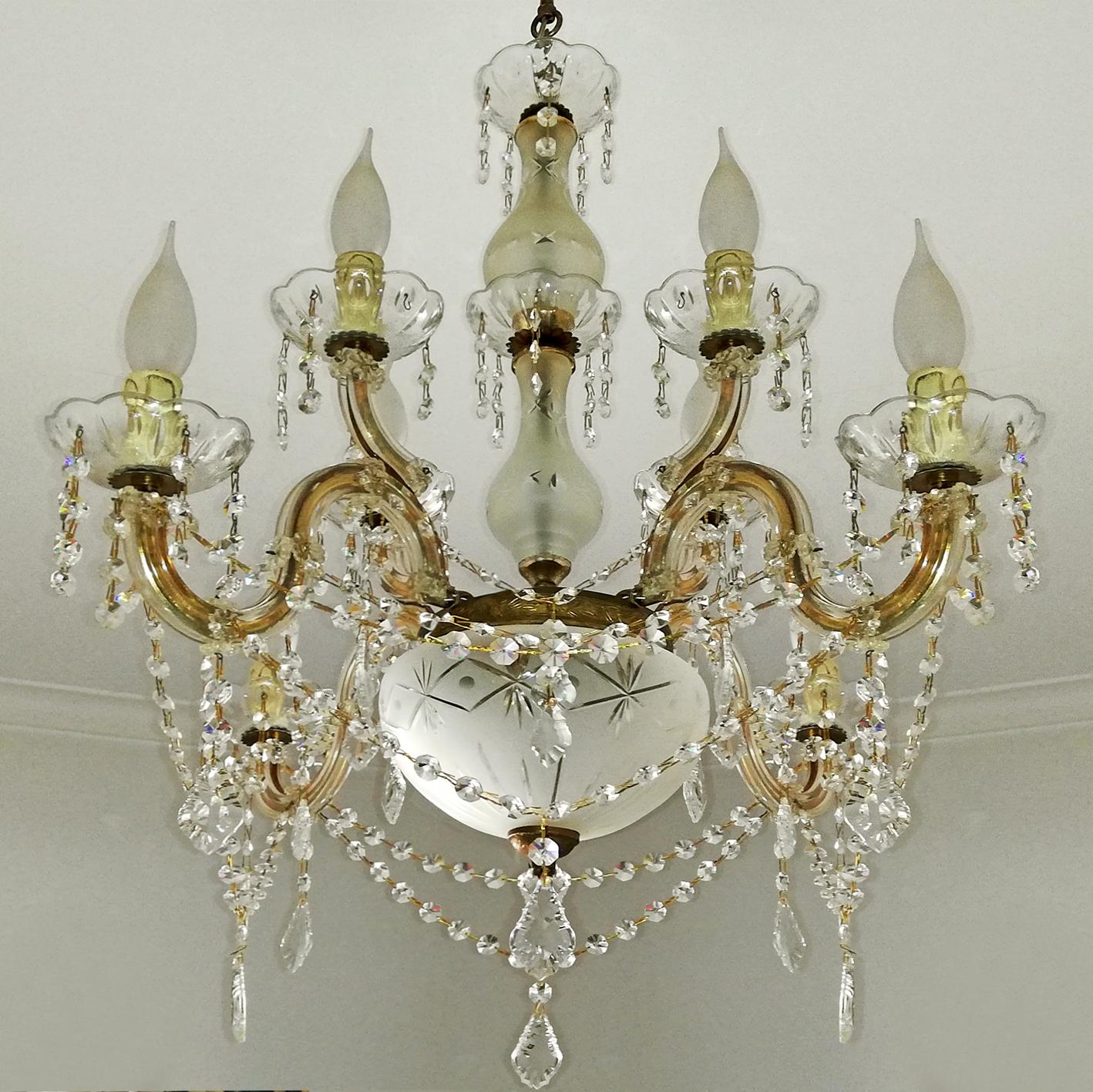 Marie Therese eight-light crystal chandelier with cut glass bowl, crystal drops and swags
Measures:
Diameter 26.7 in/ 68 cm
Height 30.7 in /78 cm
Weight 11 lb/5 Kg
Eight light bulbs E14/ good working condition
Assembly required. Bulbs not