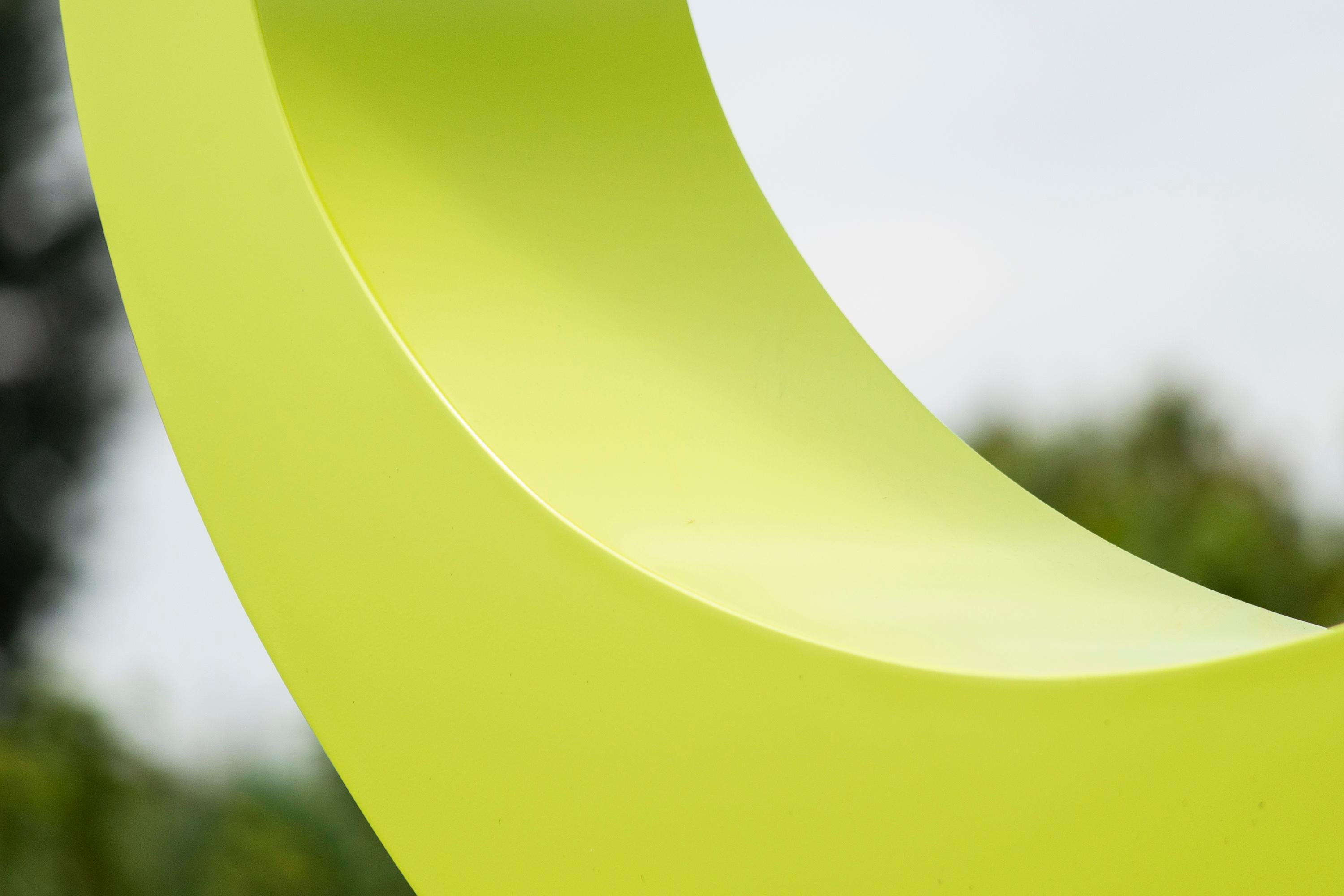 This evocative contemporary outdoor sculpture was hand-forged by Marie-Ève Fréchette. The Quebec sculptor is known for her bold choices of form and colour often inspired by her early career in science. This large oval aluminum sculpture is painted