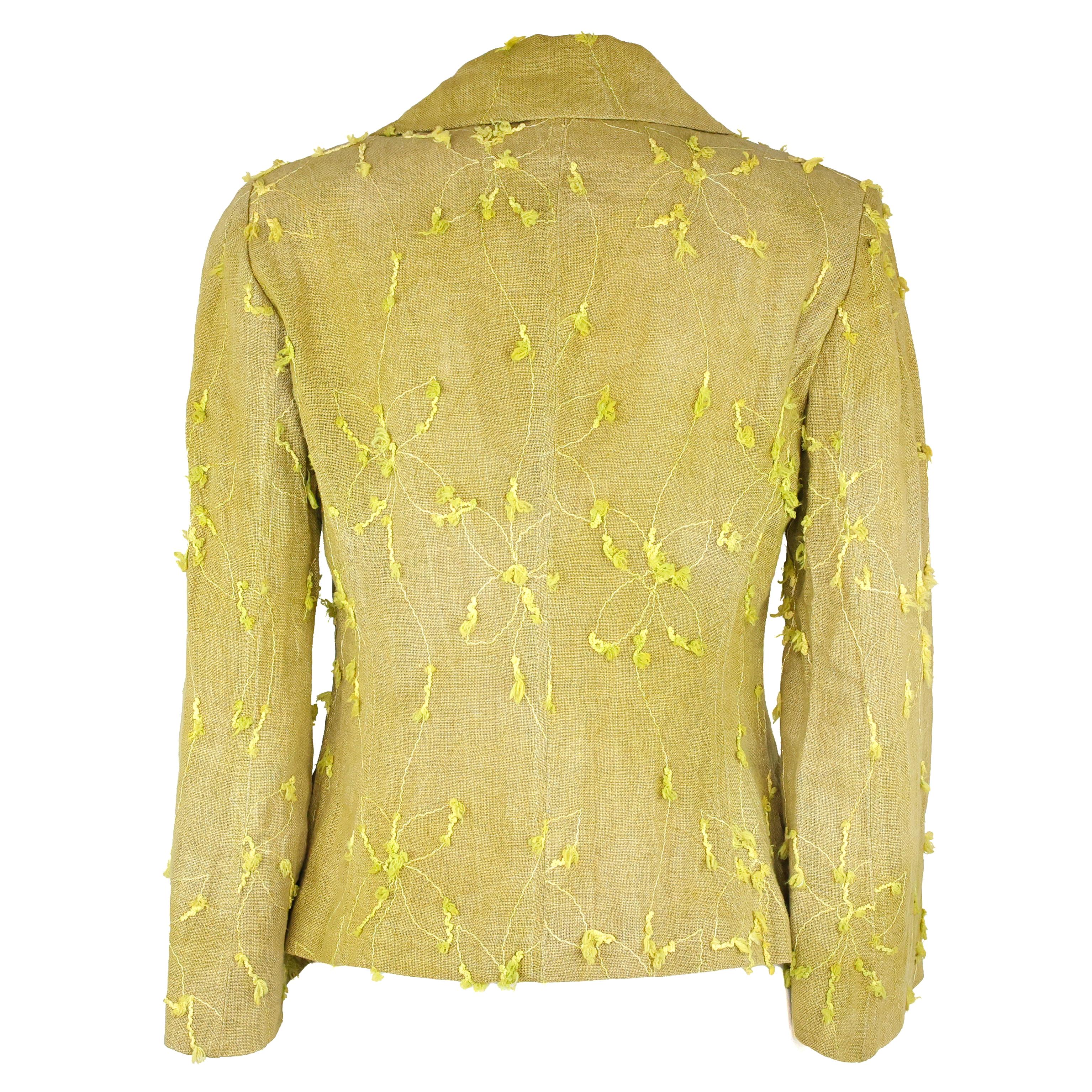 Tailored blazer by MARIELLA BURANI made of structured linen blend fabric with decorative all-over embroidery, elegant lapel collar, light shoulder pads, small wooden buttons, piped flap pockets and slightly flared sleeve, size 40 IT.