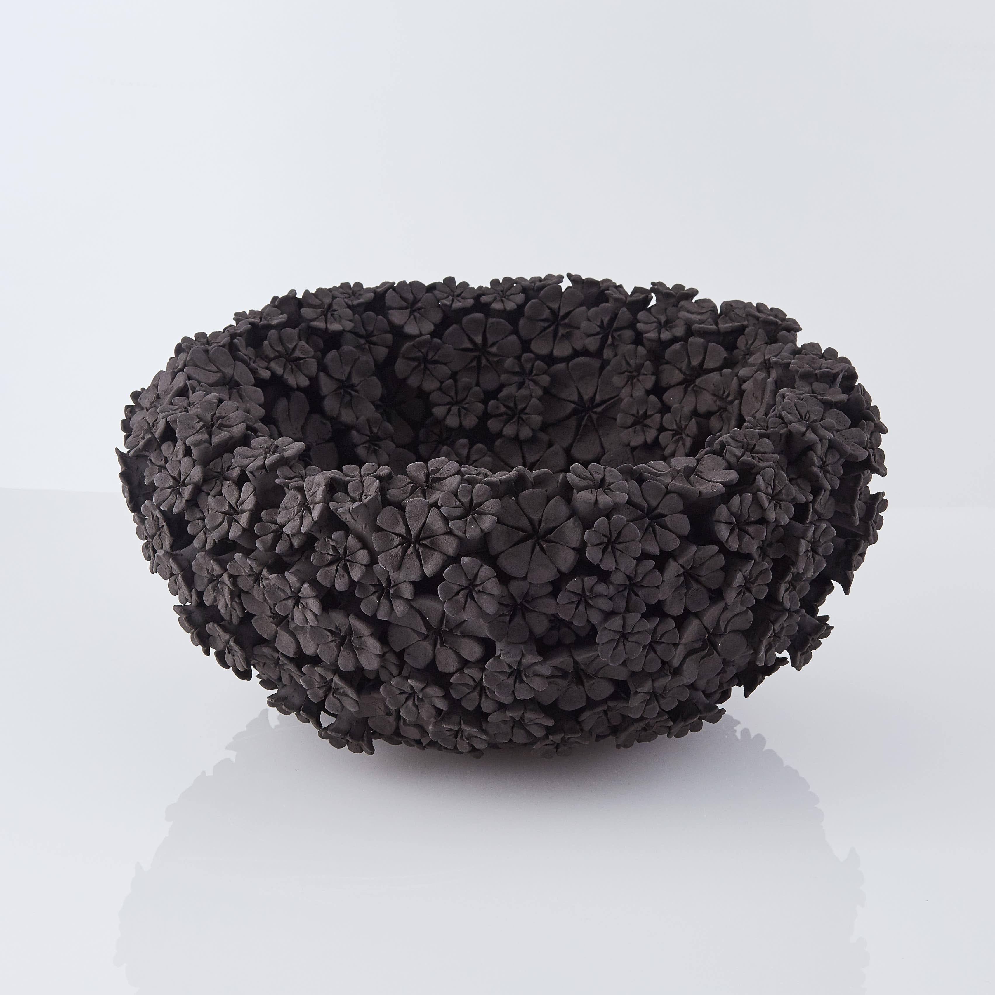 Hand-Crafted Marigold Bowl, a floral black stoneware ceramic centrepiece by Vanessa Hogge