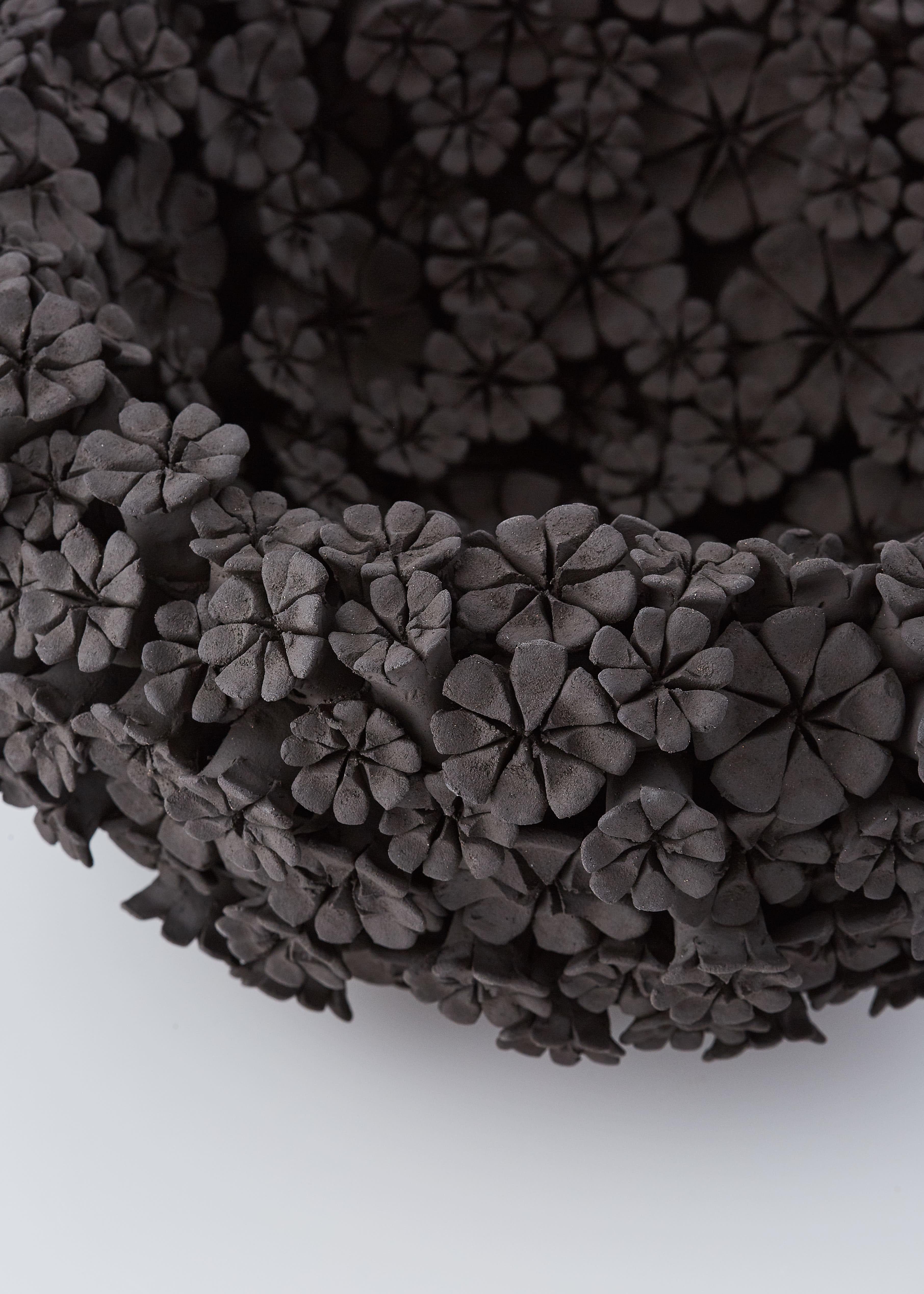 Contemporary Marigold Bowl, a floral black stoneware ceramic centrepiece by Vanessa Hogge