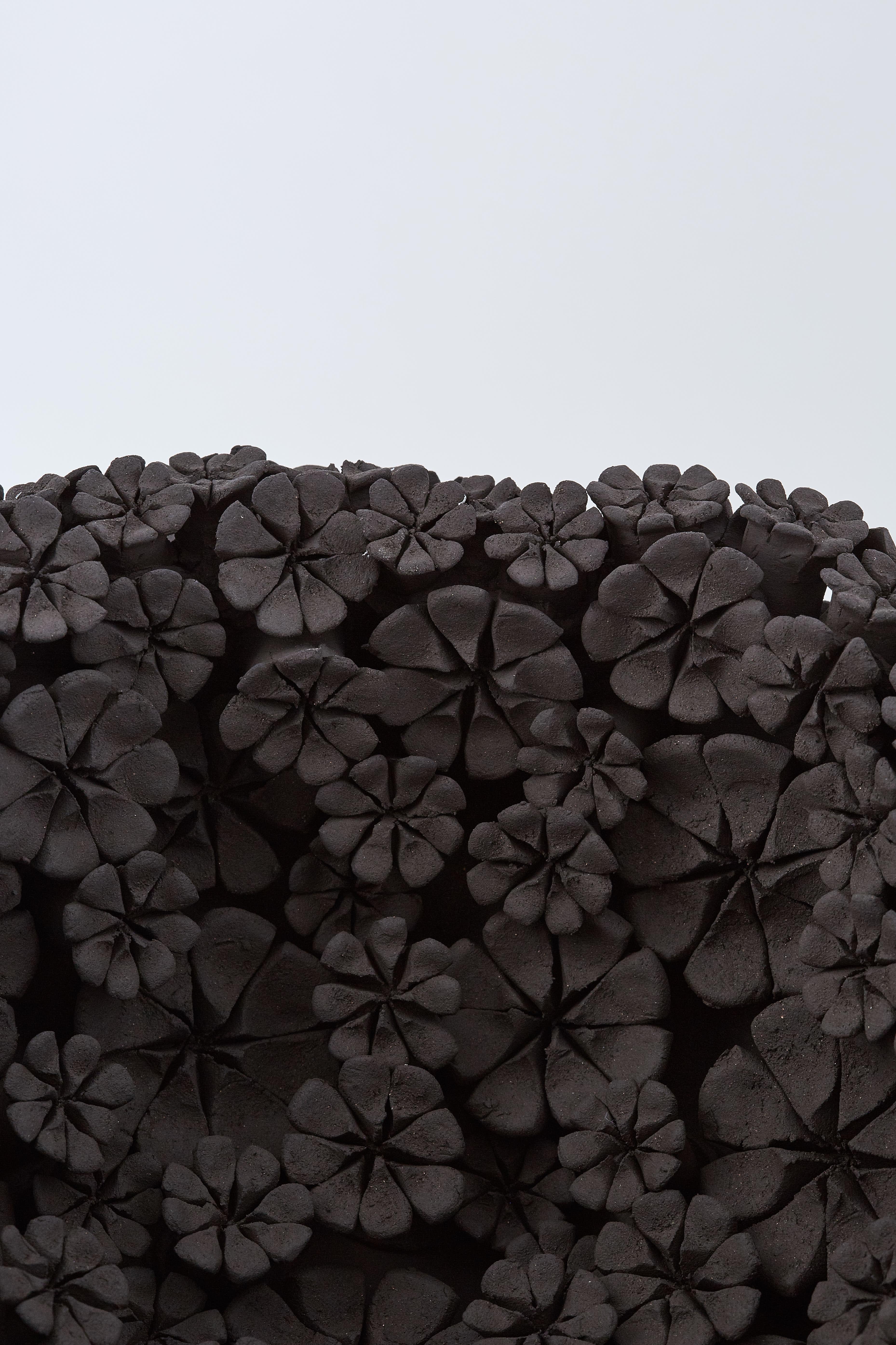Ceramic Marigold Bowl, a floral black stoneware ceramic centrepiece by Vanessa Hogge