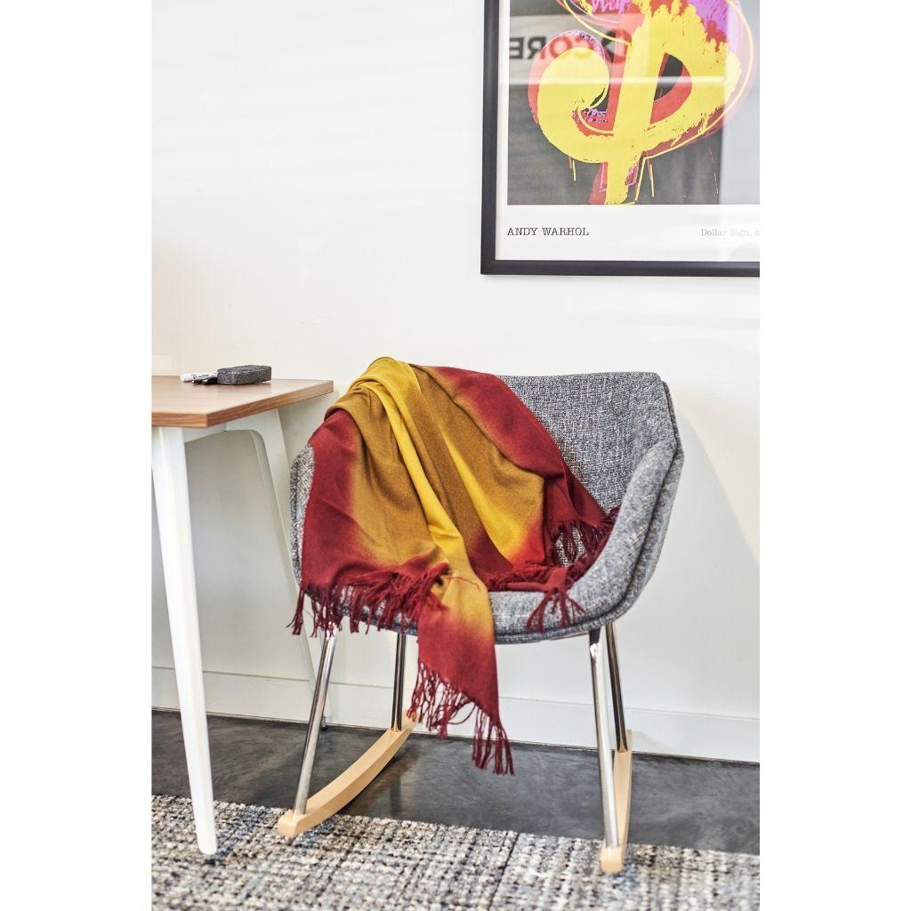 Custom design by Studio Variously, Marigold throw / blanket is handwoven by master weavers in Nepal and dip dyed entirely with eco-friendly certified Swiss dyes. A sustainable design brand based out of Michigan, Studio Variously exclusively