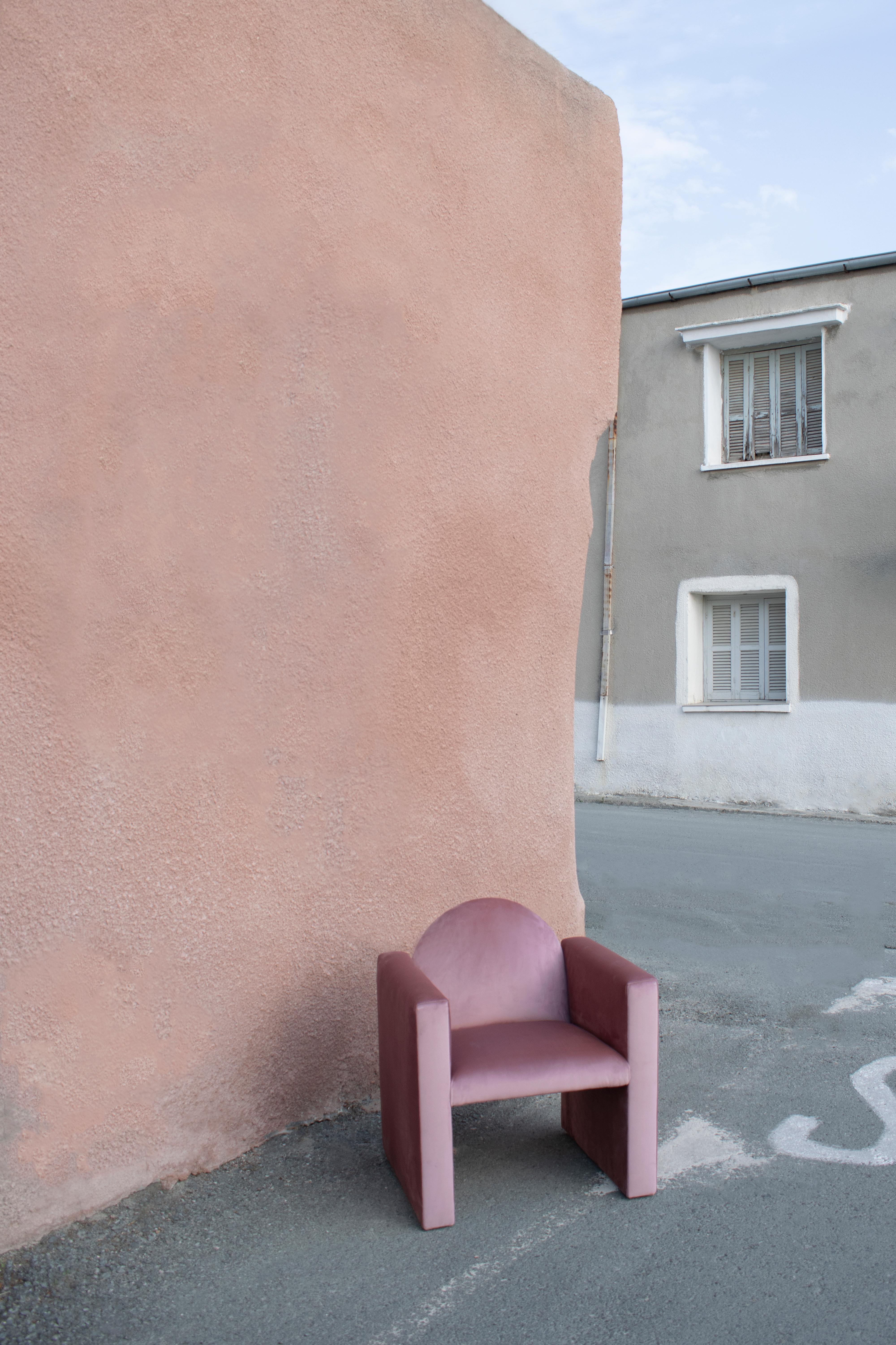 Fully upholstered armchair, in a plush, water repellent and easy to clean fabric.

Followed by the first Marika seat piece, the Marika Pink is reintroduced in a shade of pink dyed fabric. It’s warm toned colour changes throughout its surface as it