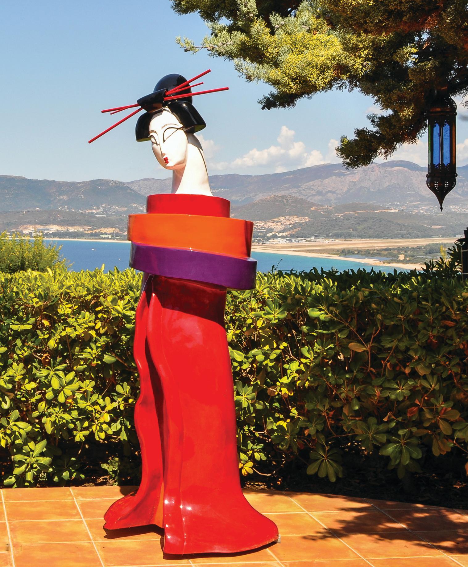 Mariko’s Gueishas are unique monumental contemporary sculptures made of resin and reinforced with an inside metallic structure, finished with a bi-component urethane paint, extremely resistant to UV exposure and outside weather. 
Mariko grew up in