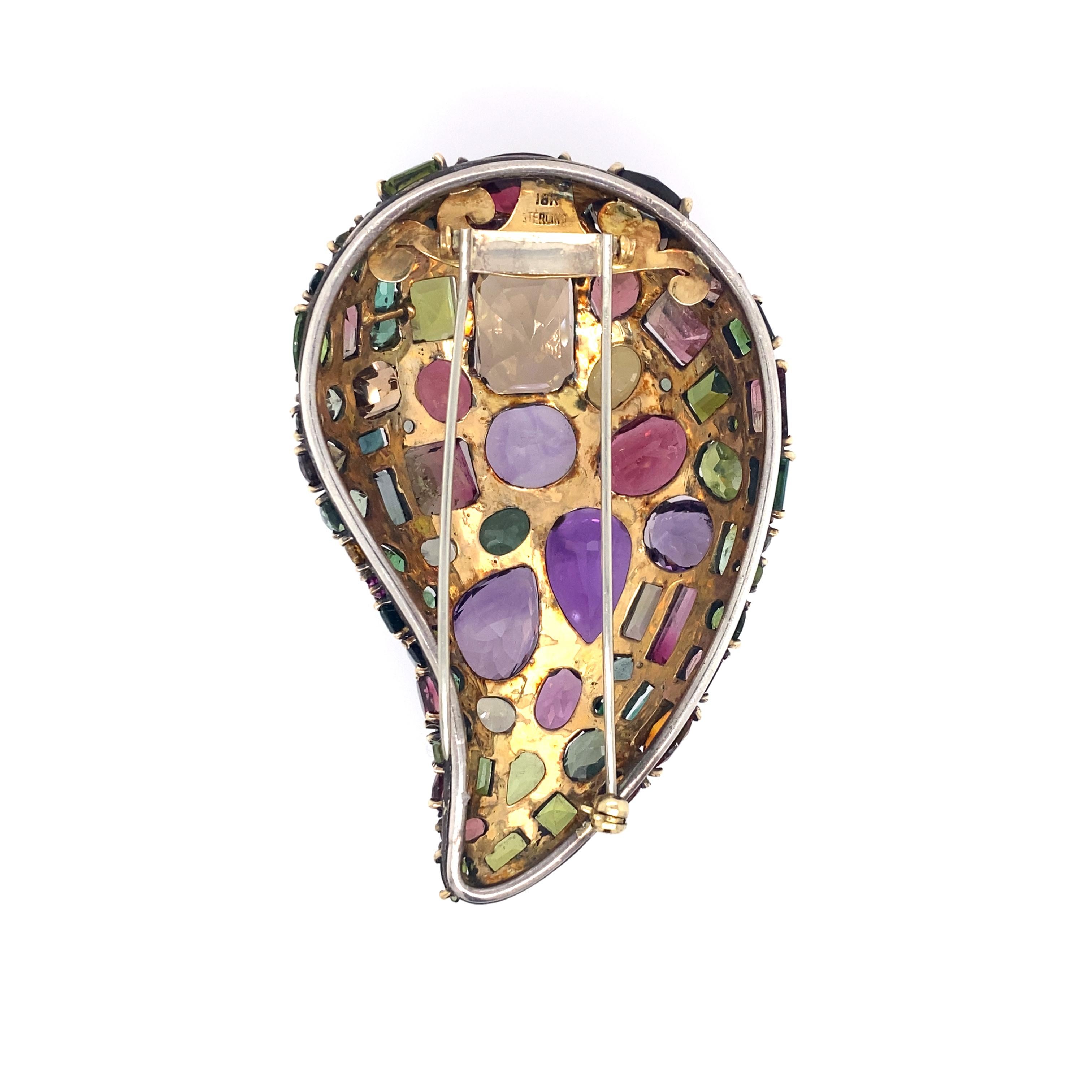 Marilyn Cooperman Gem Set Brooch  18k yellow gold/sterling silver, The brooch contains  various cuts of amethysts, citrines, tourmalines, aquamarines, peridots and emeralds weighing approximately 55 carats in total, stamped 