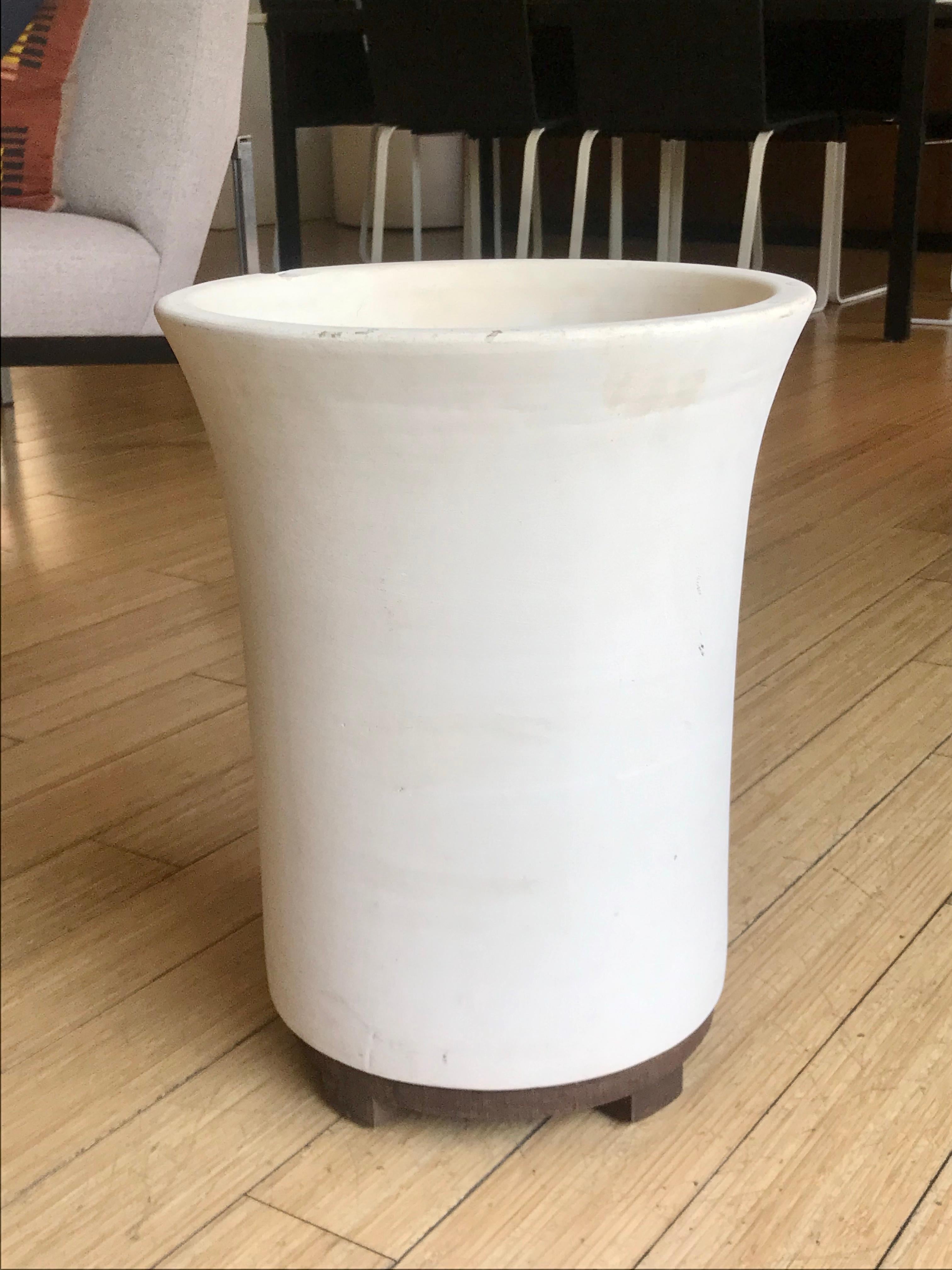 California design
Form + function
Natural bisque clay
Walnut base
Like an old Etruscan vase it has minor wear, a small chip on the rim and a flake at the bottom
No cracks
Rings like a bell
No drain hole
Great for indoors with a bouquet of