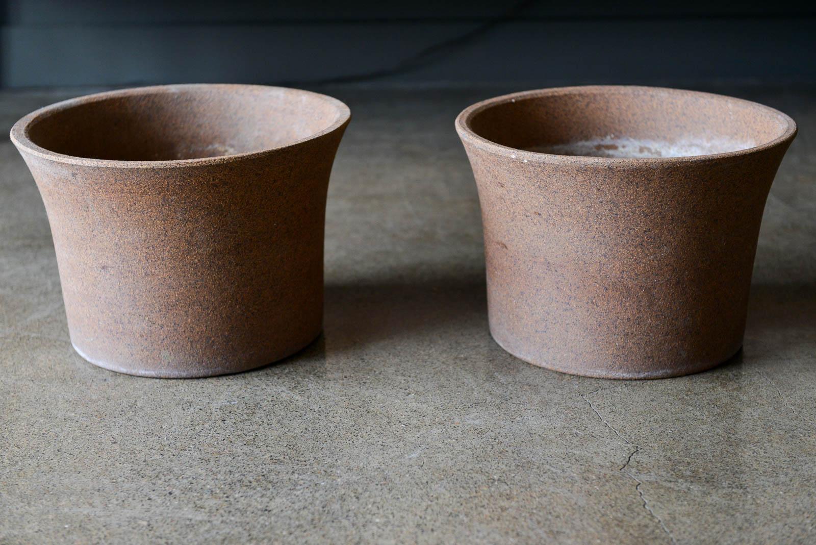 Marilyn Kay Austin for Architectural Pottery unglazed vessels, pair, circa 1970. Beautiful stoneware unglazed versions in very good original condition with matching inscribed dates on bottom of 10-20-1976. Both have some slight calcium deposits but
