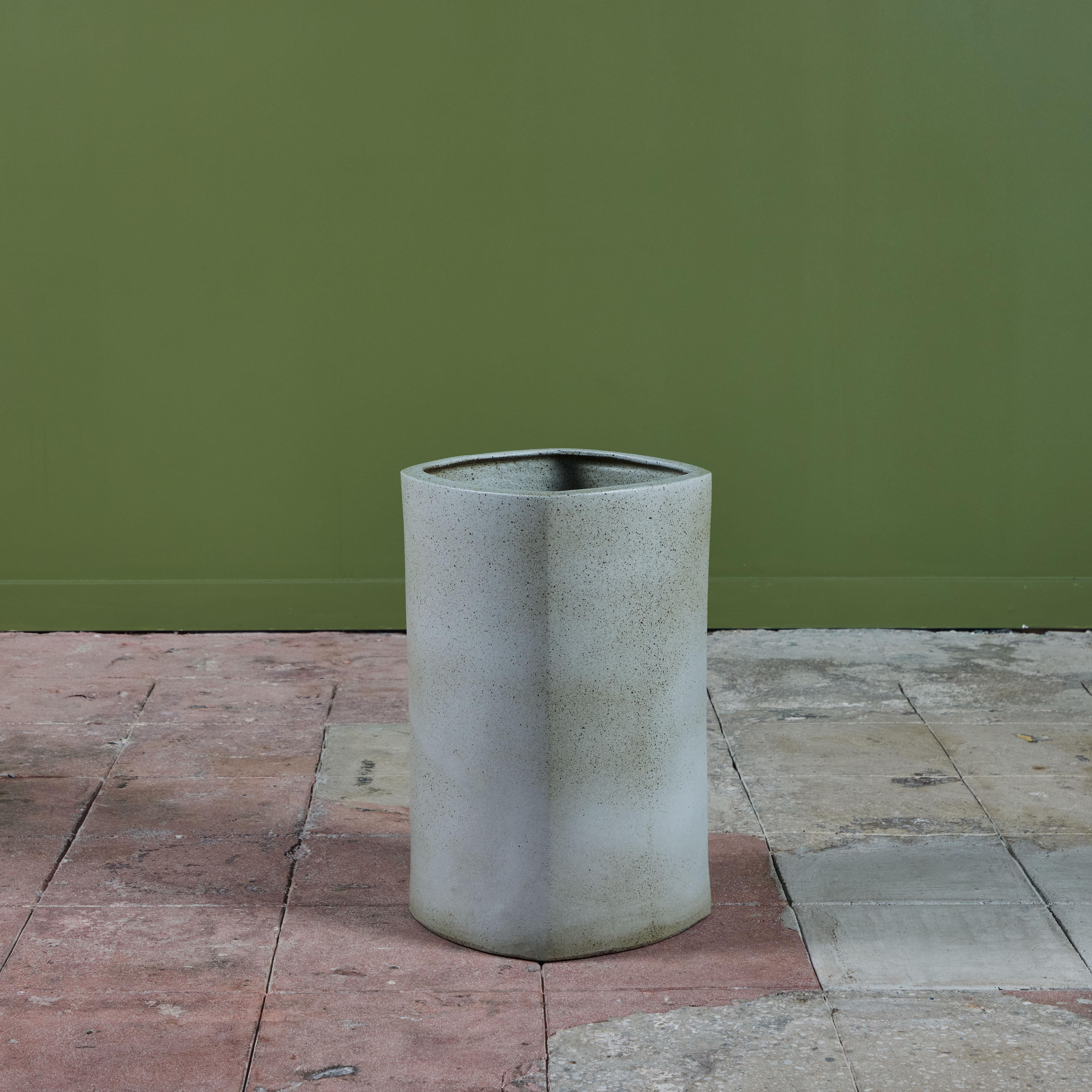 Glazed planter in a gray speckle glaze by ceramics artist Marilyn Kay Austin for Architectural Pottery. This example, features a rounded square shape. The gray glaze can be found both inside and out. Could be used as a stylish planter for indoor or