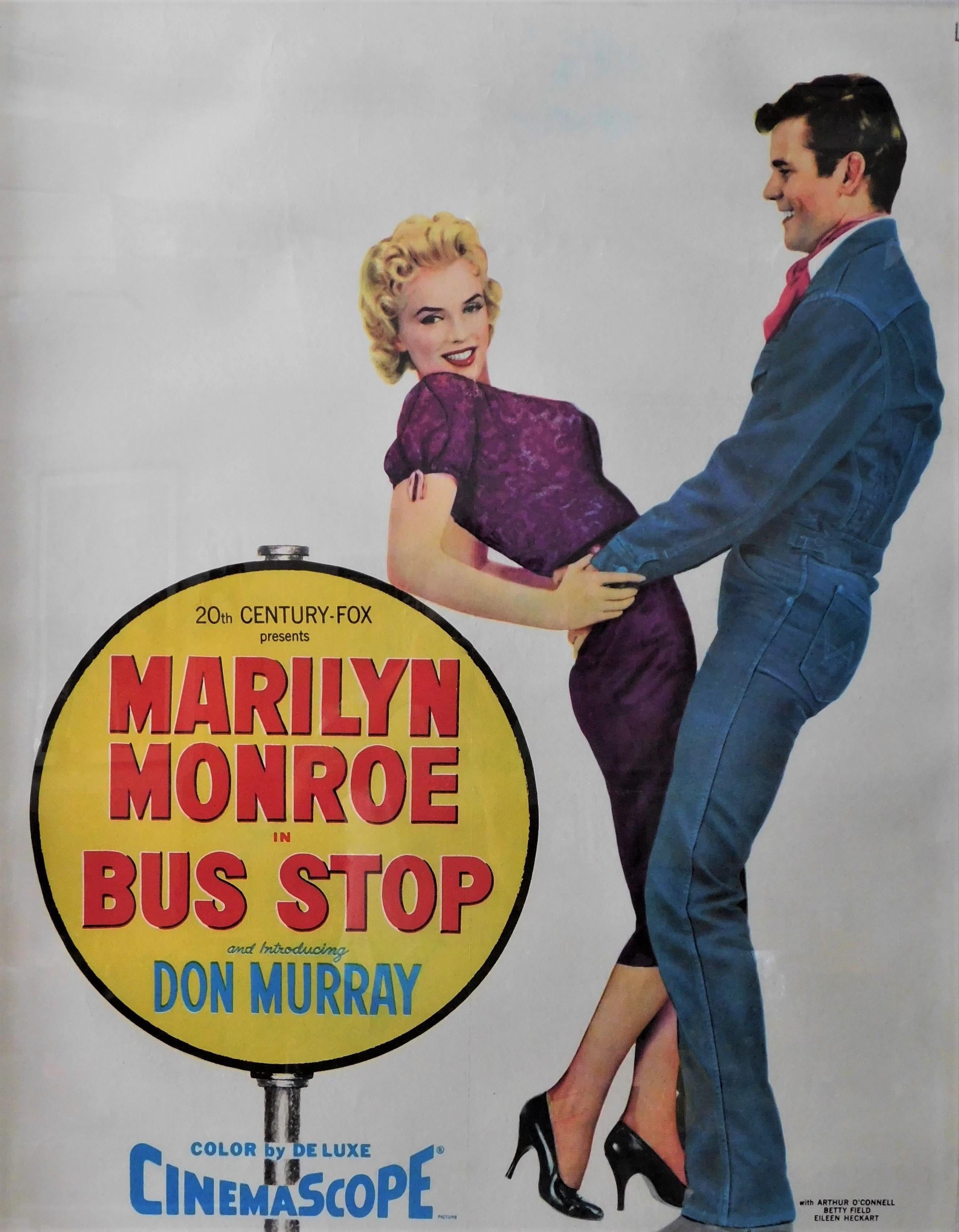 Bus Stop 1956 full-length poster of cowboy Don Murray holding a very sexy Marilyn Monroe beside a bus stop sign. An original vintage linen backed one-sheet theatrical film movie poster (1 sheet; measures 27