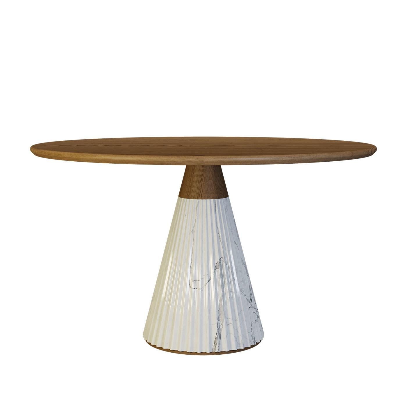 An iconic design of contemporary sophistication, this gorgeous round table by Libero Rutilo will add a refined and elegant accent to a modern living or dining area. Handmade of ash wood, the round top rests on a conical base made of pleated white