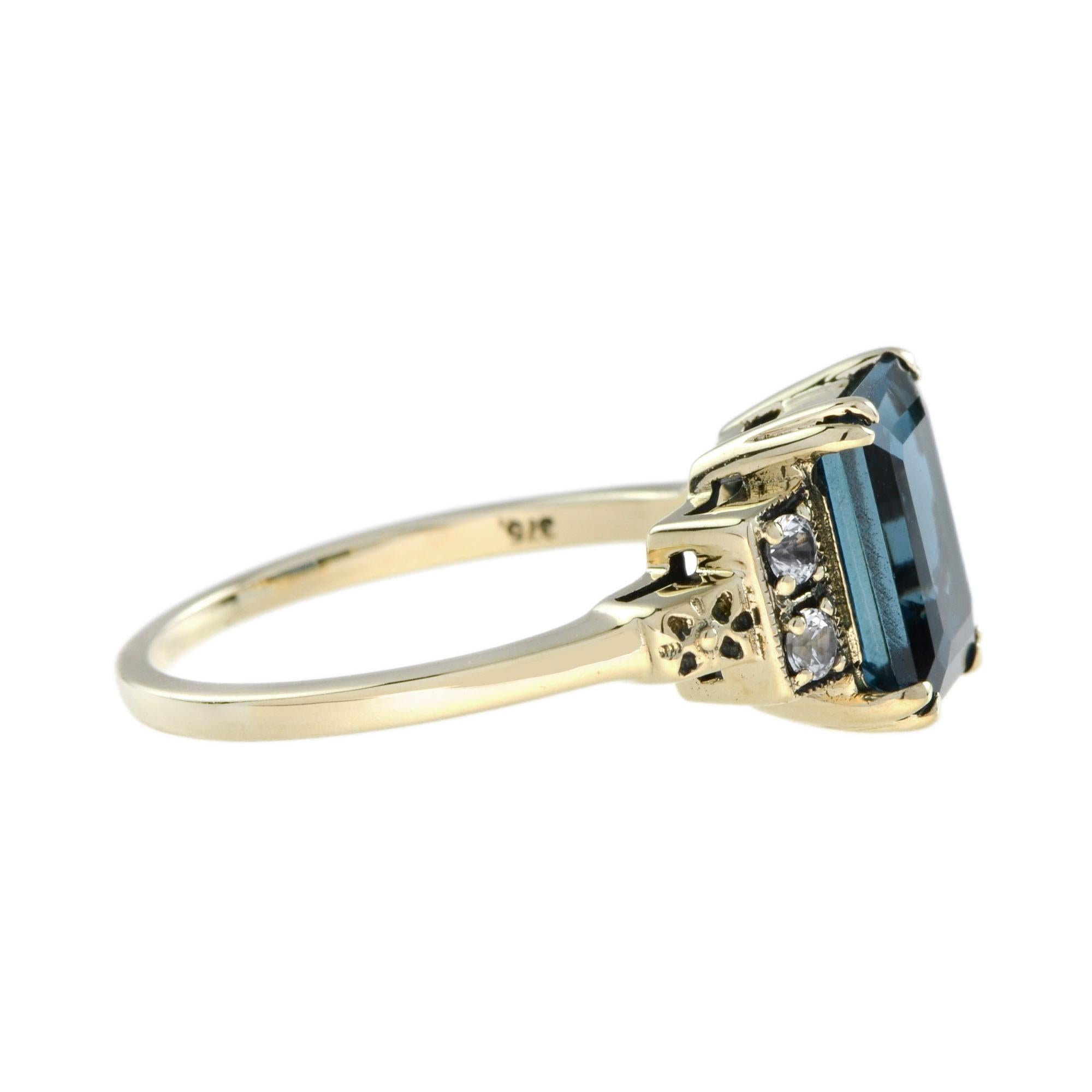 Marin Verlobungsring aus 9 Karat Gold mit blauem und weißem Saphir im Smaragdschliff Damen im Angebot