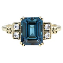 Emerald Cut London Blue Topaz and White Sapphire Engagement Ring in 9K Gold