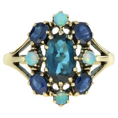 Marin Fleur Oval London Blue Topaz with Sapphire and Opal Ring in 9K Yellow Gold