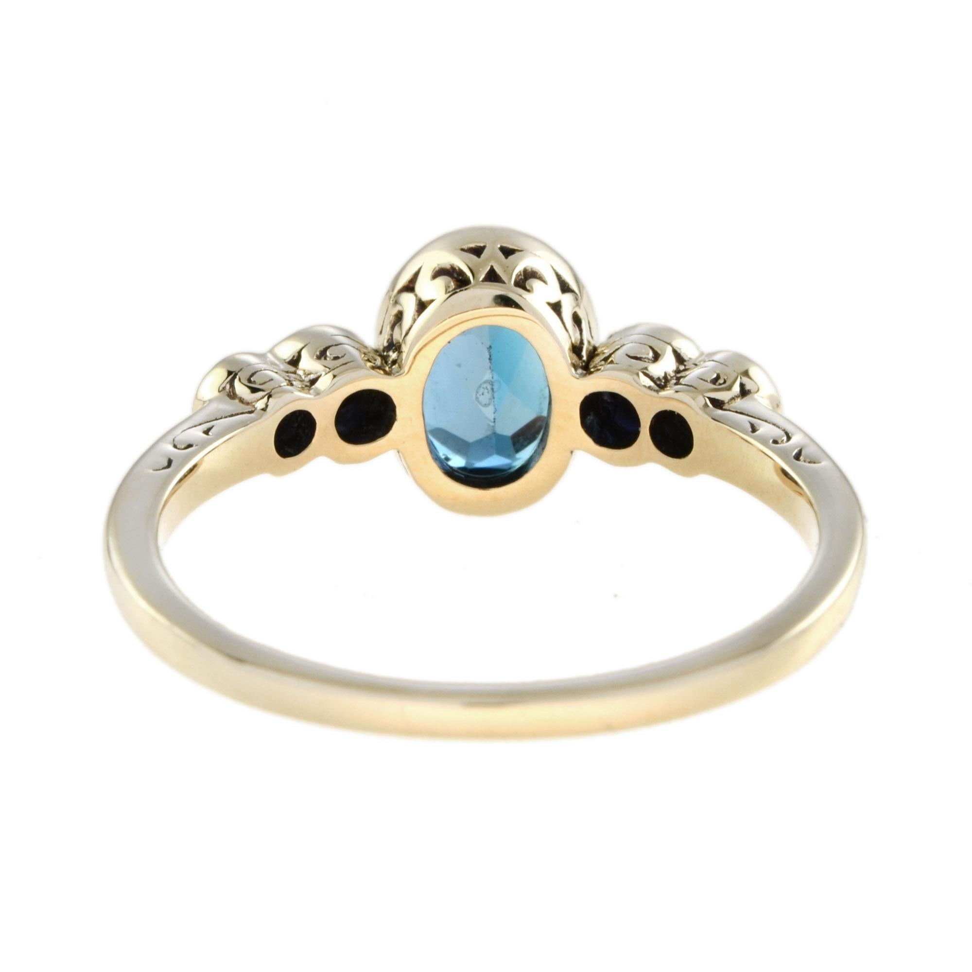 Women's Marin Oval London Blue Topaz and Sapphire Solitaire Ring in 9K Yellow Gold For Sale