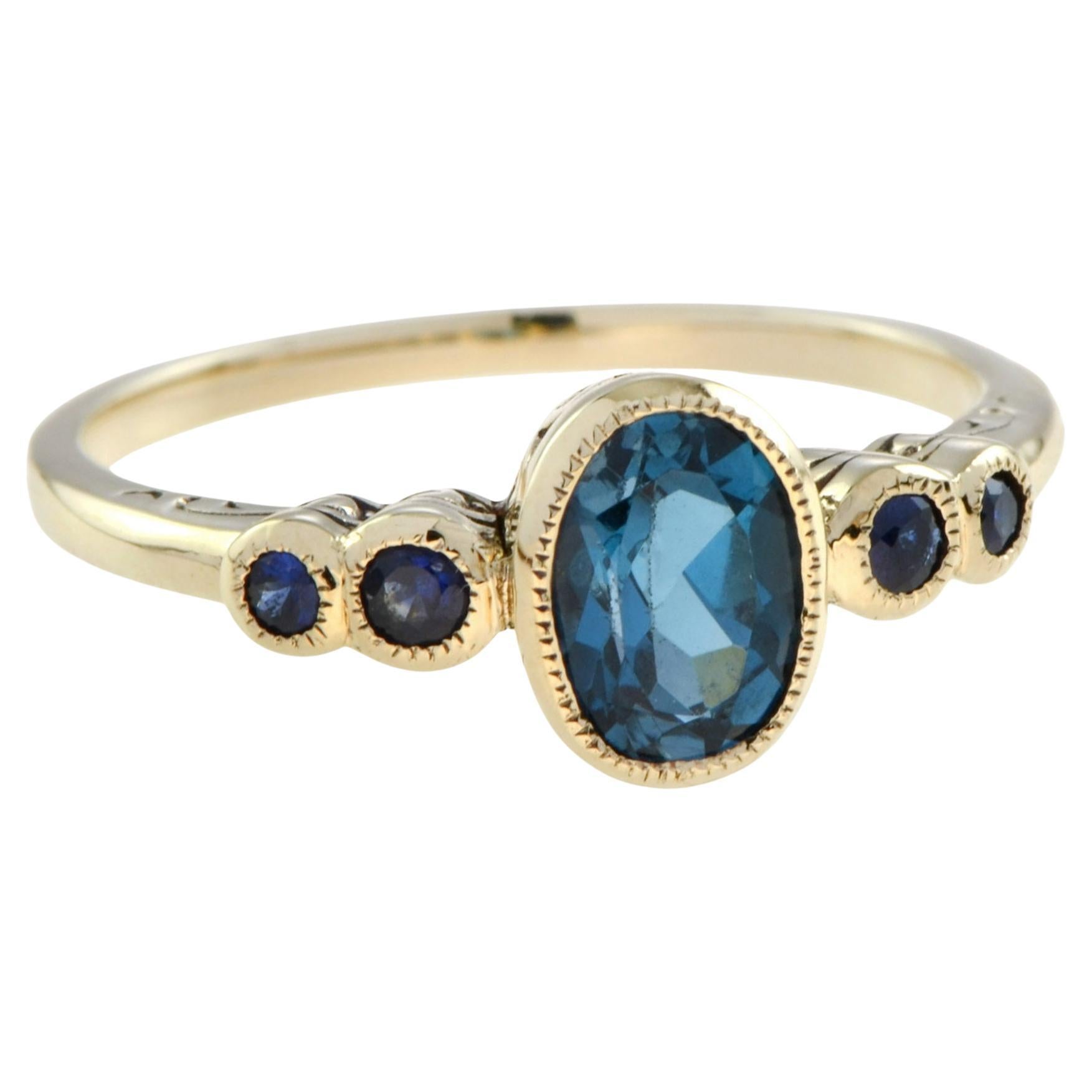 Marin Oval London Blue Topaz and Sapphire Solitaire Ring in 9K Yellow Gold For Sale