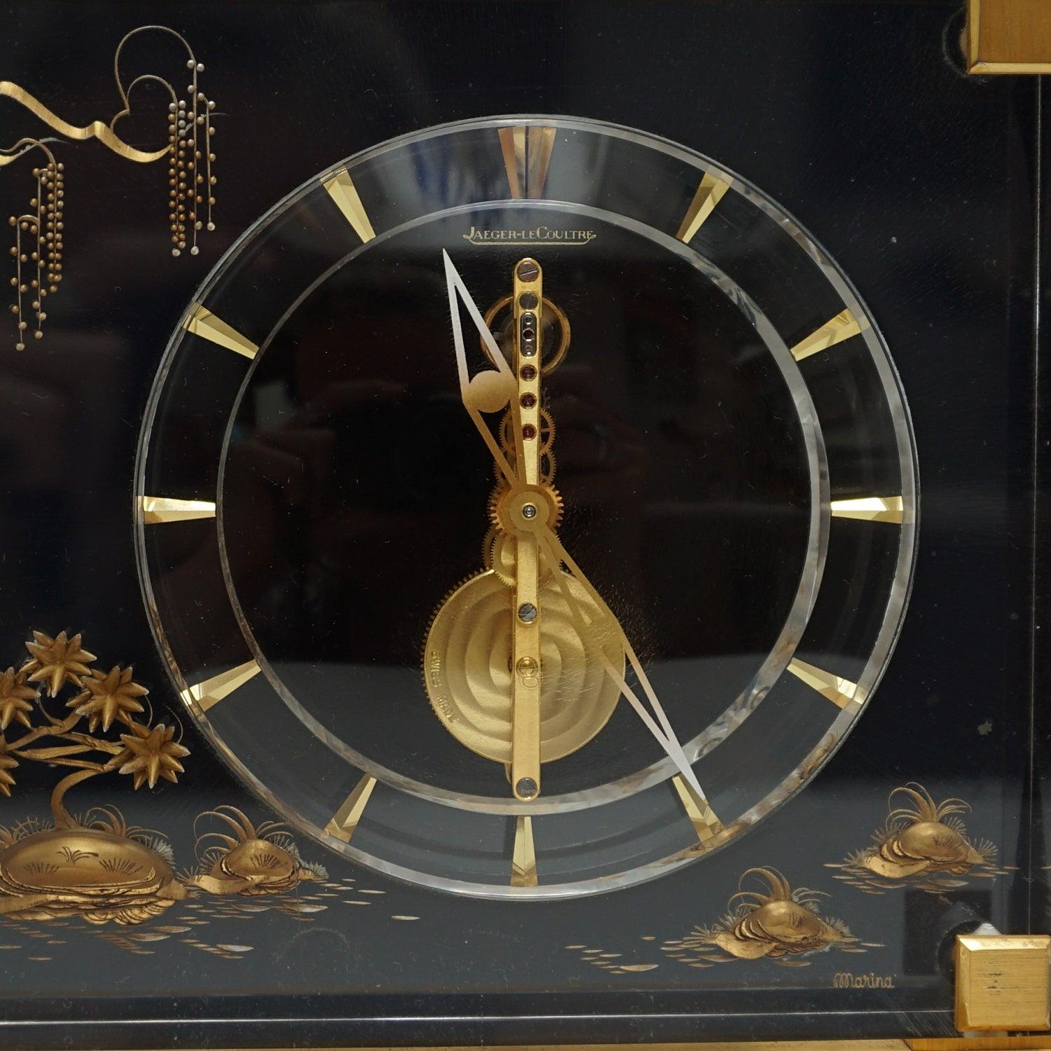 Mid-Century Modern 'Marina' A Mid-Century Jaeger-LeCoultre Mantel Clock Set Over a Brass Base