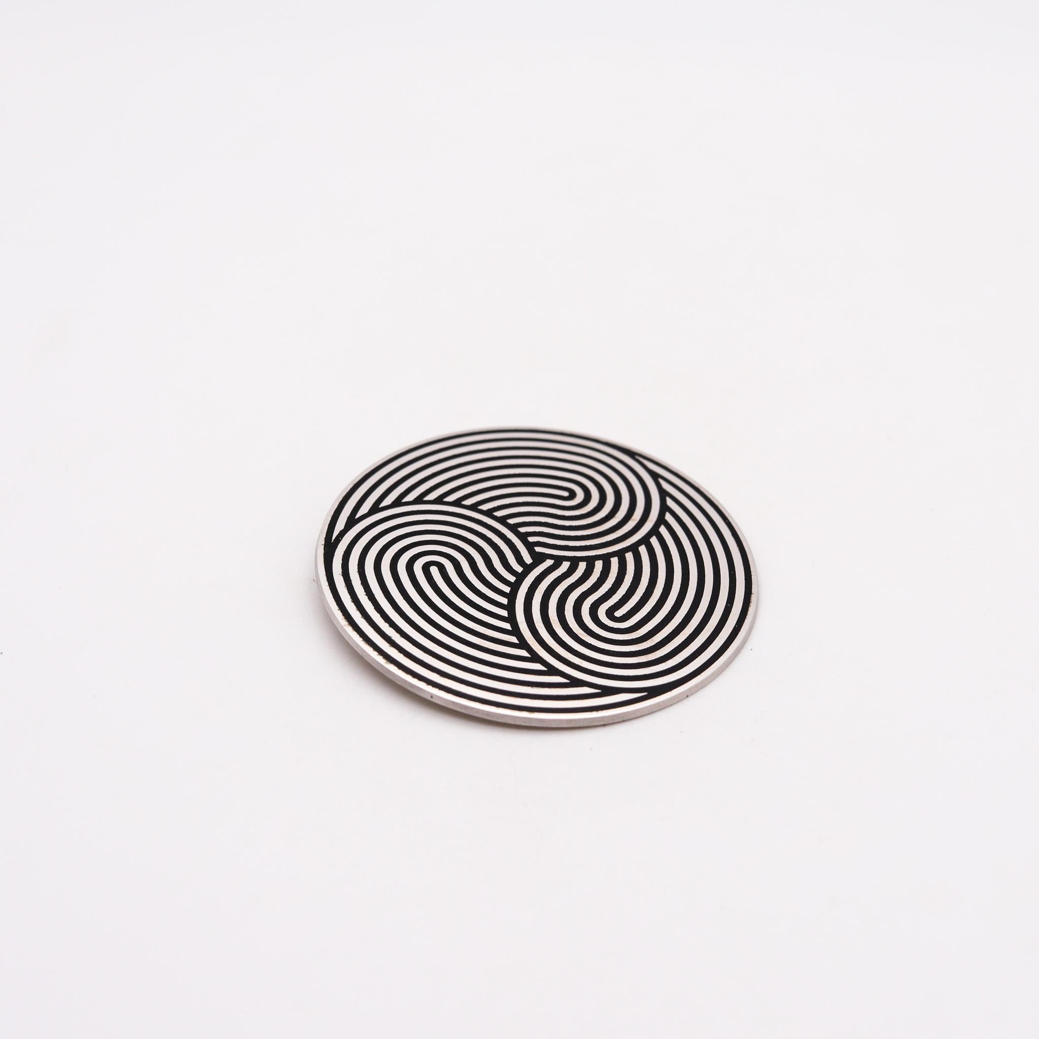 Op-Art brooch pendant designed by Marina Apollonio (1940-).

An extremely rare piece of op-art, created in Paris France by the artist Marina Apollonio, back in the 1966. It was made in a closed edition of only 12 pieces and crafted in solid