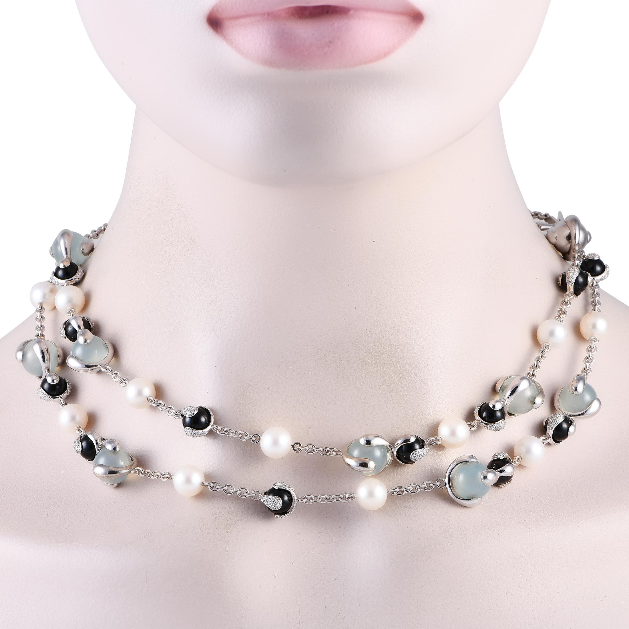 From Marina Bulgari's high-jewelry house, this Marina B. long necklace presents a sober interpretation of the 80s glitz and glamour. The 36long chain is detailed with a mix of diamond-embraced onyx gemstones, pearls, and pale blue aquamarines. Wear