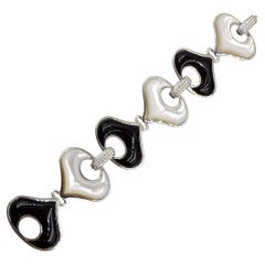 Marina B. Bracciale in oro bianco 18 carati con diamanti e onice e madreperla.