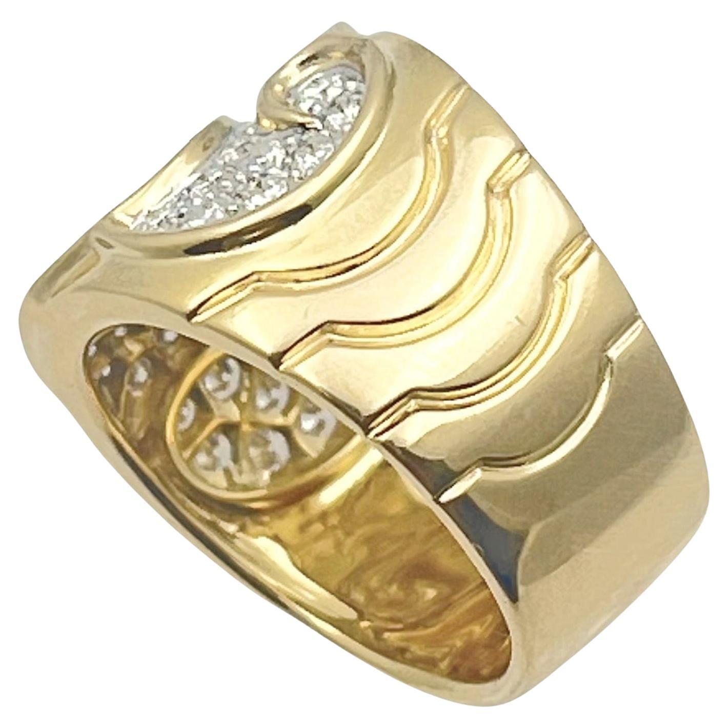 Marina B 'Onda' ring pave-set with round brilliant-cut diamonds weighing 1.22 carats in 18k yellow gold.  Diamonds are G color and VS1-VS2 clarity.  Marina B signature pattern on the tapering sides with a polished overall finish.  Signed 'MB 108150'