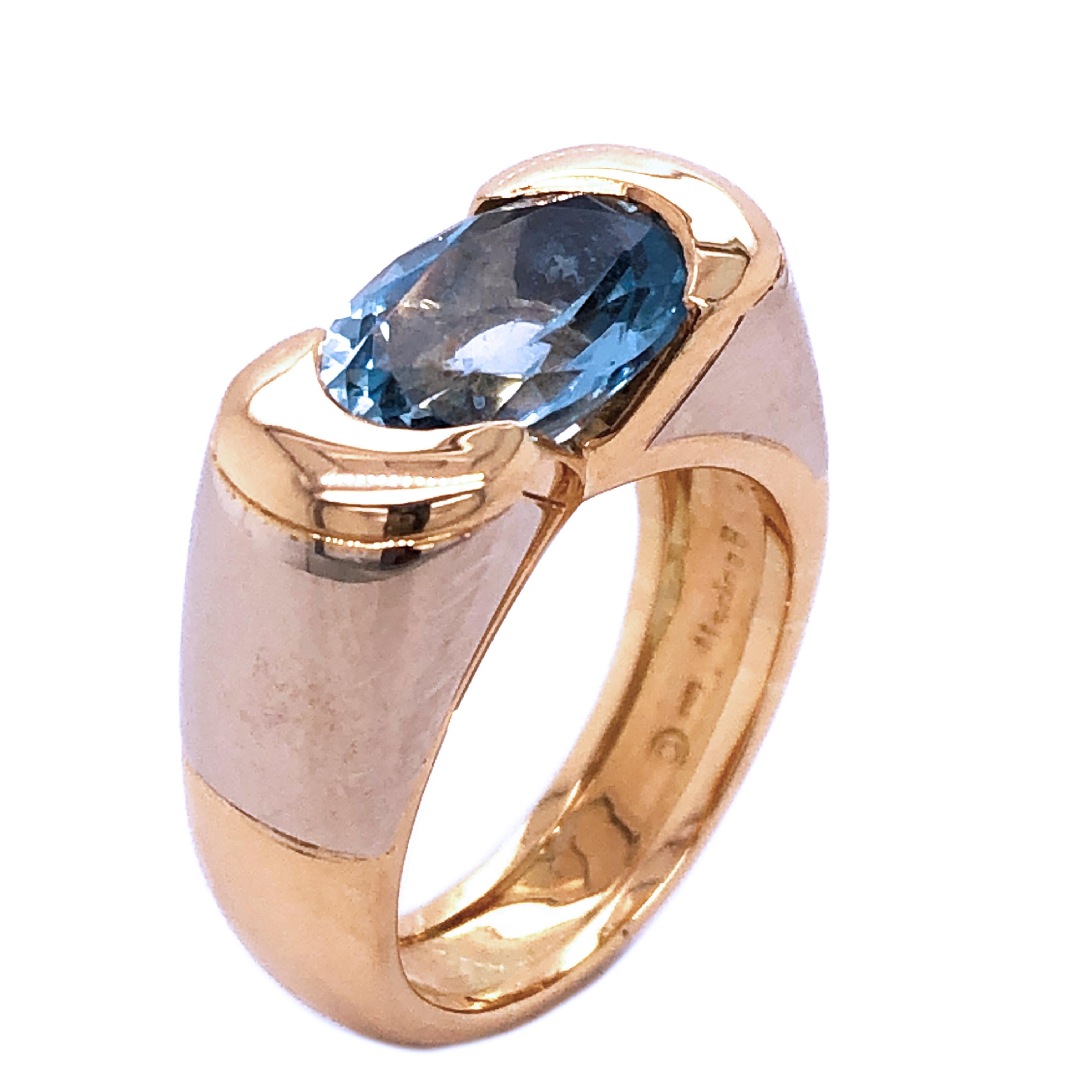 One-of-a-kind 80's Marina B. Patrizia solitaire ring featuring a top quality 3.12Kt Oval Elongated Special Cut Santa Maria Aquamarine in a chic, yet timeless white and yellow gold setting. Ring Size 6 3/4, French Size 54. This piece comes from a