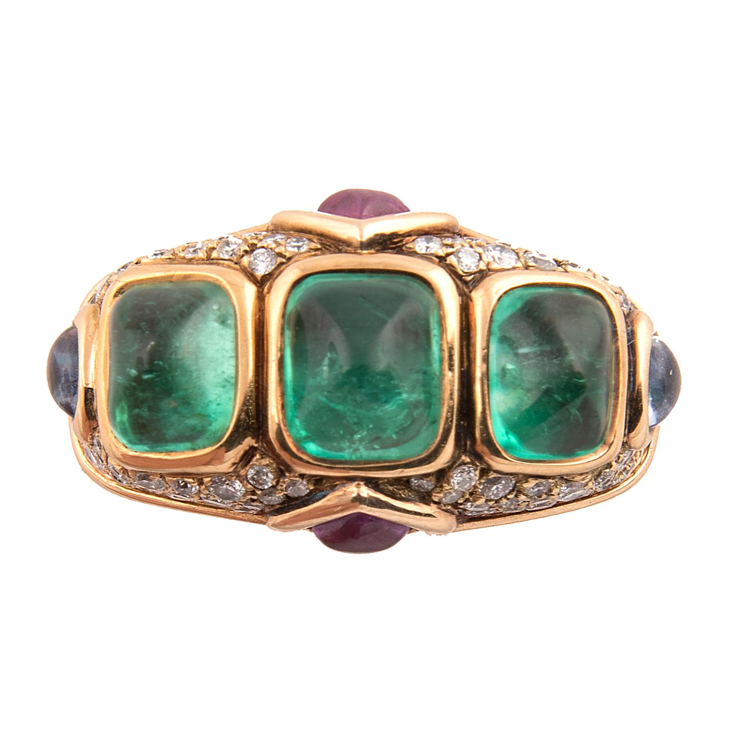 Impressive ring by Marina B (Bulgari), 18k yellow gold set with three Emeralds in line, all around decorated with pavé set diamonds heightened with tourmaline and Russian quartz
Signed Marina B, stamped 750 and numbered P1651
Ring size EU: 52, US:
