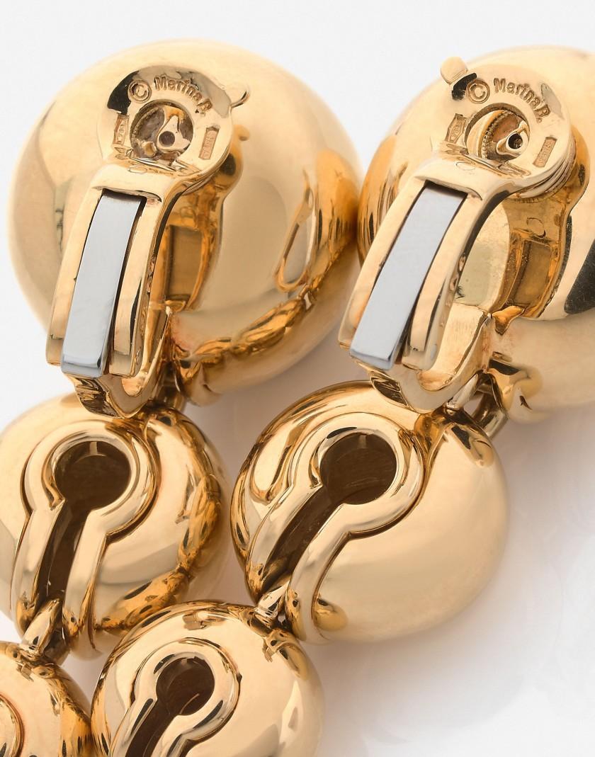 A fun pair of Marina B “Campanelli” 18 karat yellow gold bell earrings. Circa 1988.