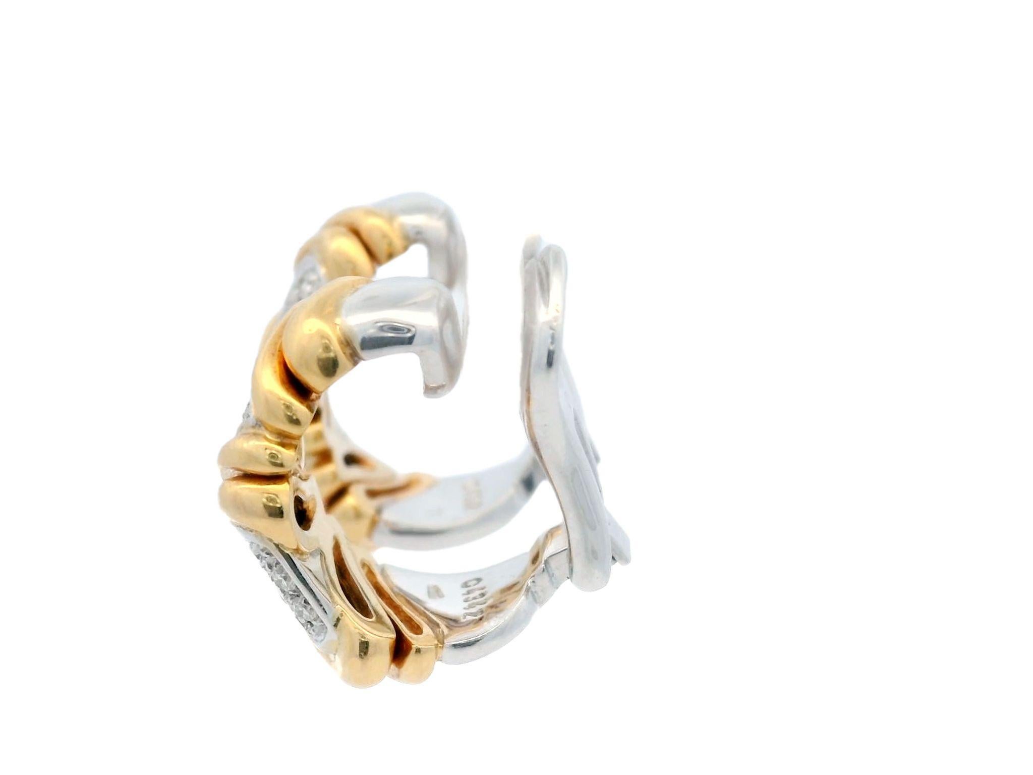 Marina B Chevron Clip on Earrings with Diamonds in 18K Yellow and White Gold 

Crafted from 18k yellow and white gold, the earrings feature smooth, flowing curves that catch the eye. The mix of the two golds adds depth to the design, while clusters