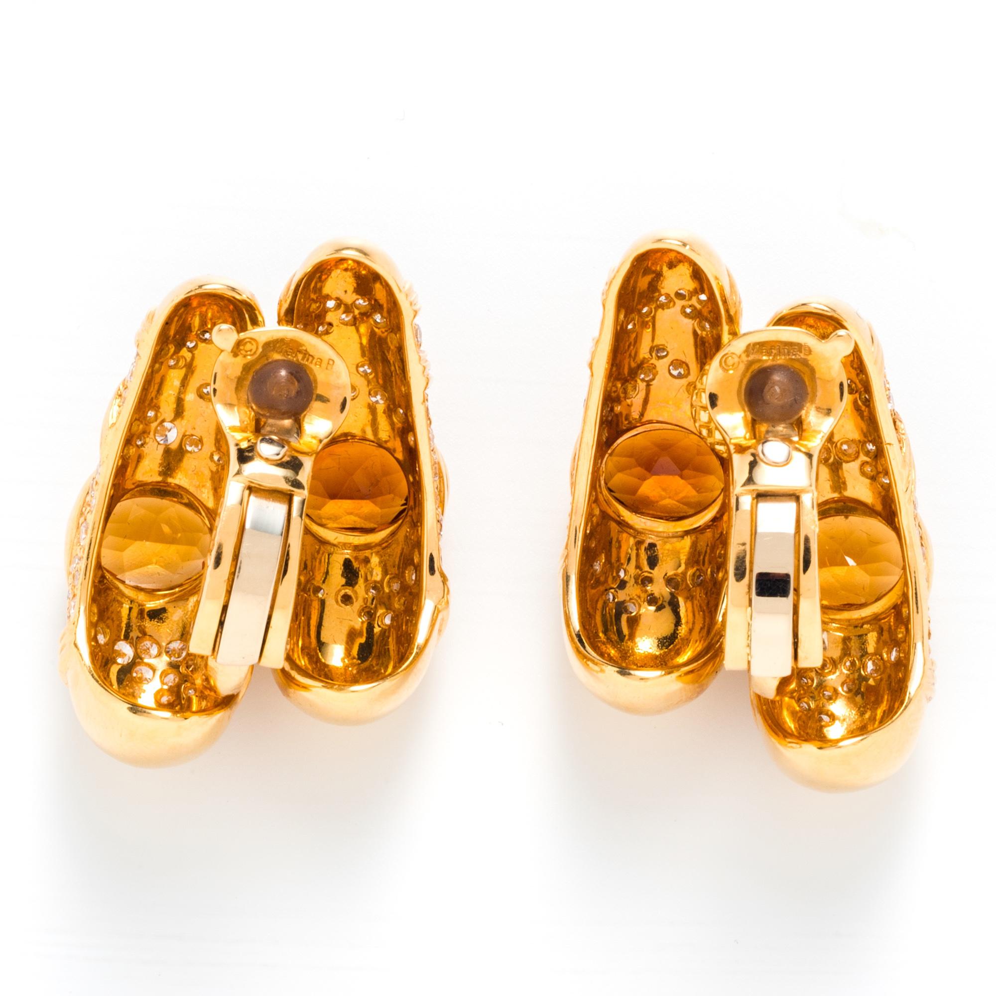 Marina B often revisited and reinterpreted her earlier designs. She first created Onda pieces in the late 1970s and continued to play with the motif throughout her career. These elegant Onda Beta earrings from 1991 are each set with two citrines in