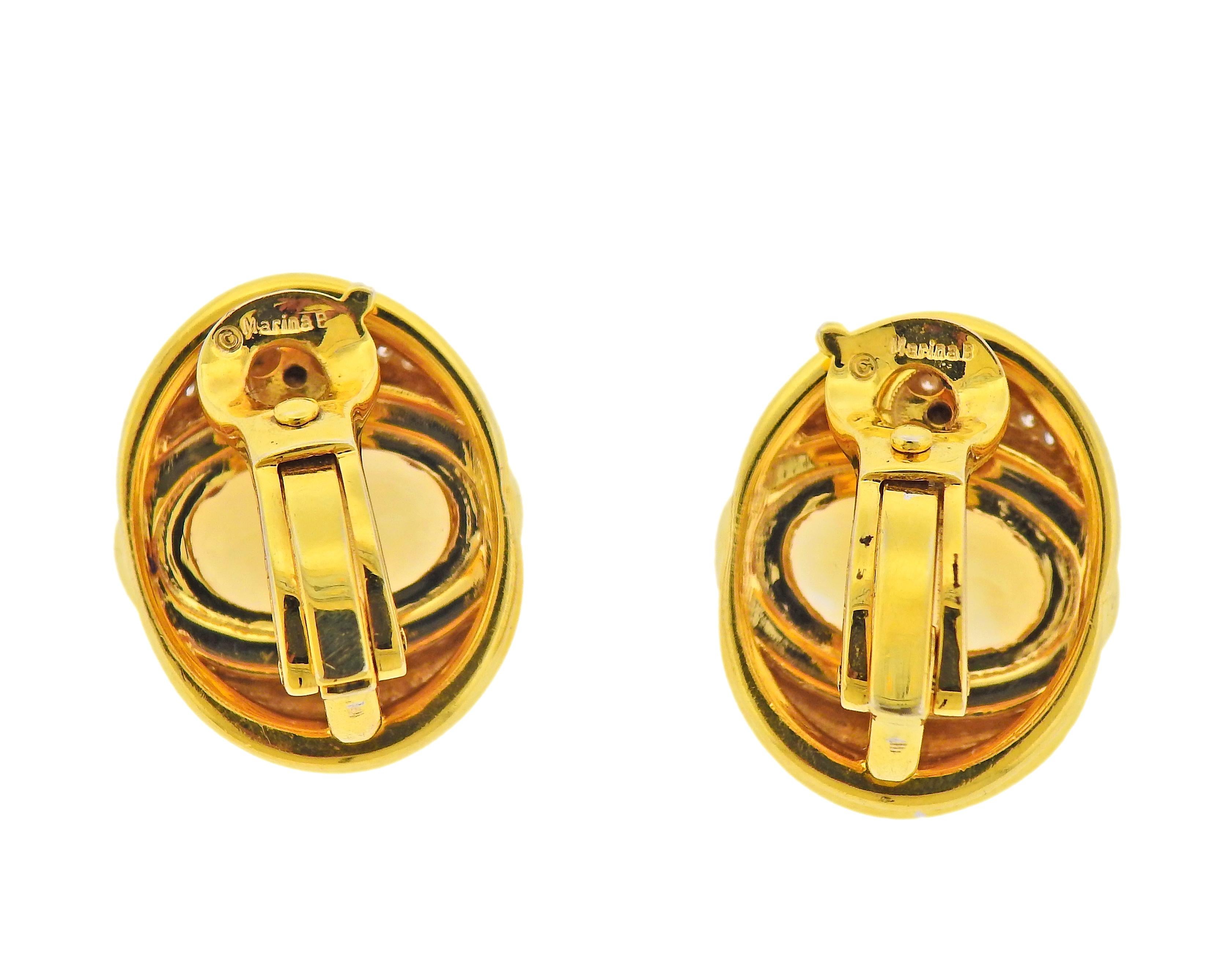 Pair of 18k yellow gold earrings by Marina B, with oval citrines and approx. 1.00ctw in diamonds. Earrings measure 22mm x 19mm. Marked: Marina B, MB 750, C2806. Weight - 24.7 grams.