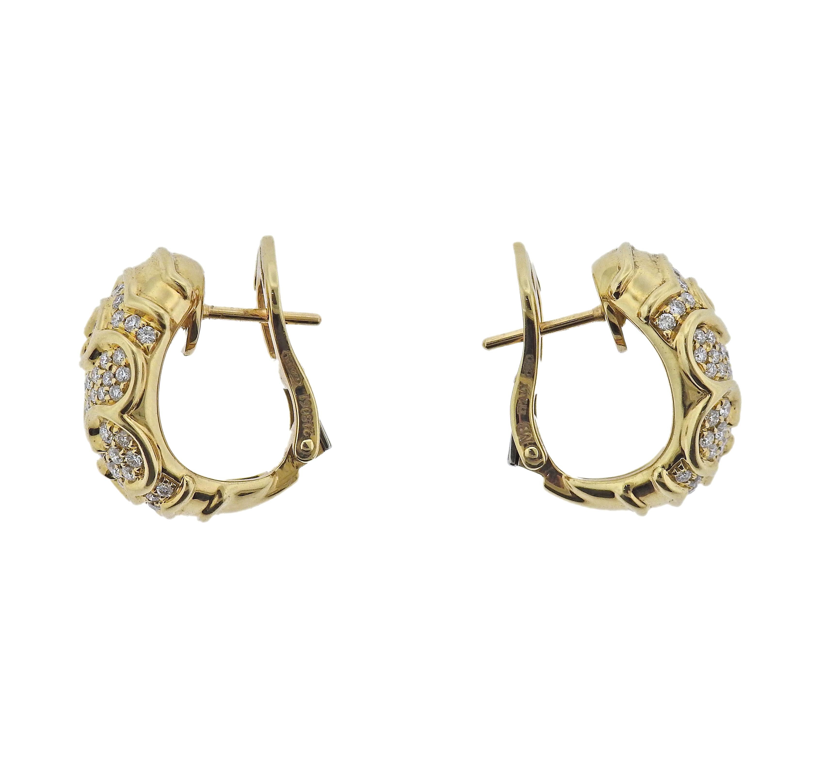 Pair of 18k gold hoop earrings by Marina B, with approx. 1.00ctw in G/VS diamonds. Earrings measure 19mm x 13mm. Marked: Marina B, 750, MB, Italy, 218061. Weight - 12.2 grams.