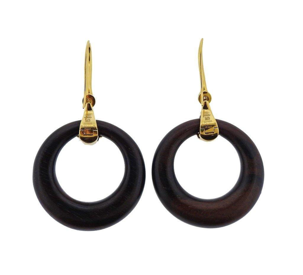 Pair of 18k gold Karine earrings by Marina B, featuring interchangeable circle bottoms - wood & onyx. Tops set with approx. 0.96ctw in G/Vs diamonds. Earrings are 65mm long, circles are 37mm in diameter. Weigh tis 22.5 grams. Marked Marina B, MB,